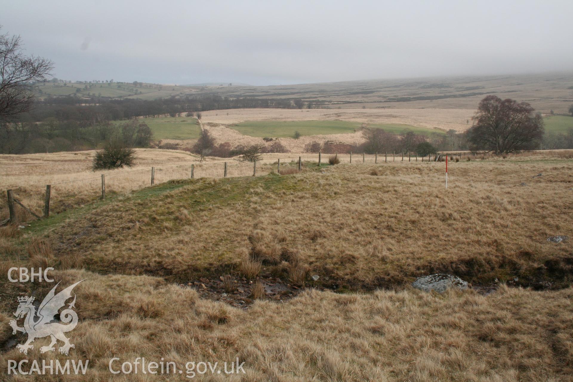 View of mound from the south-west; 1m scale.