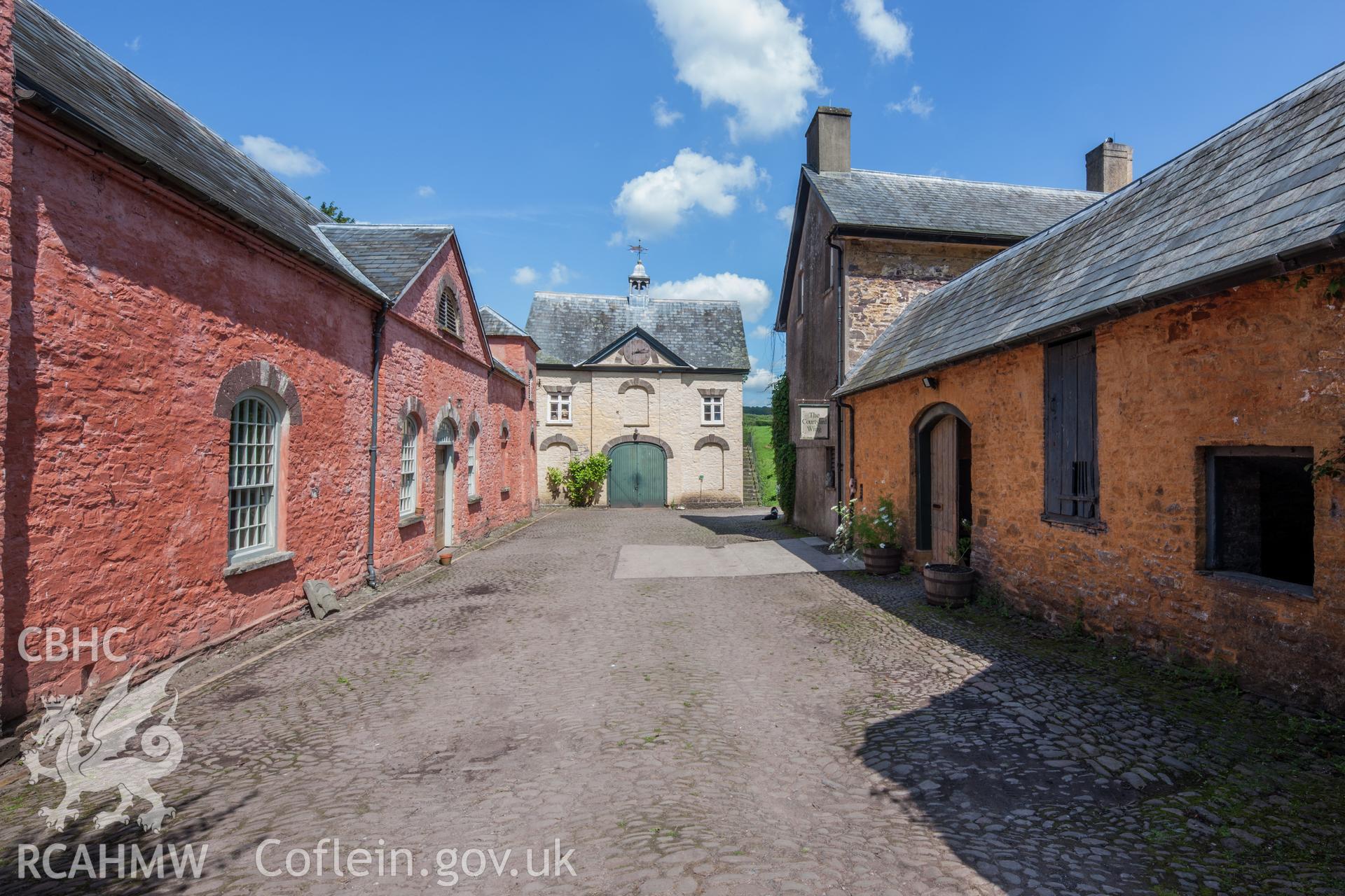 View of stables and coach house from the south southwest.