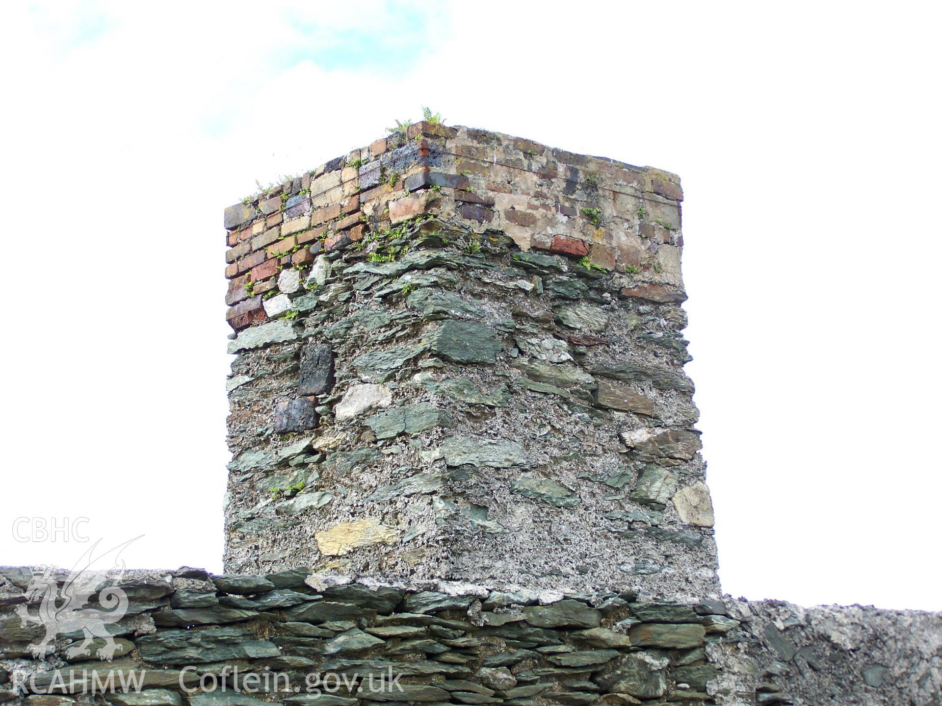 Viewed from outside the former shipyard wall, the upper courses of the chimney.