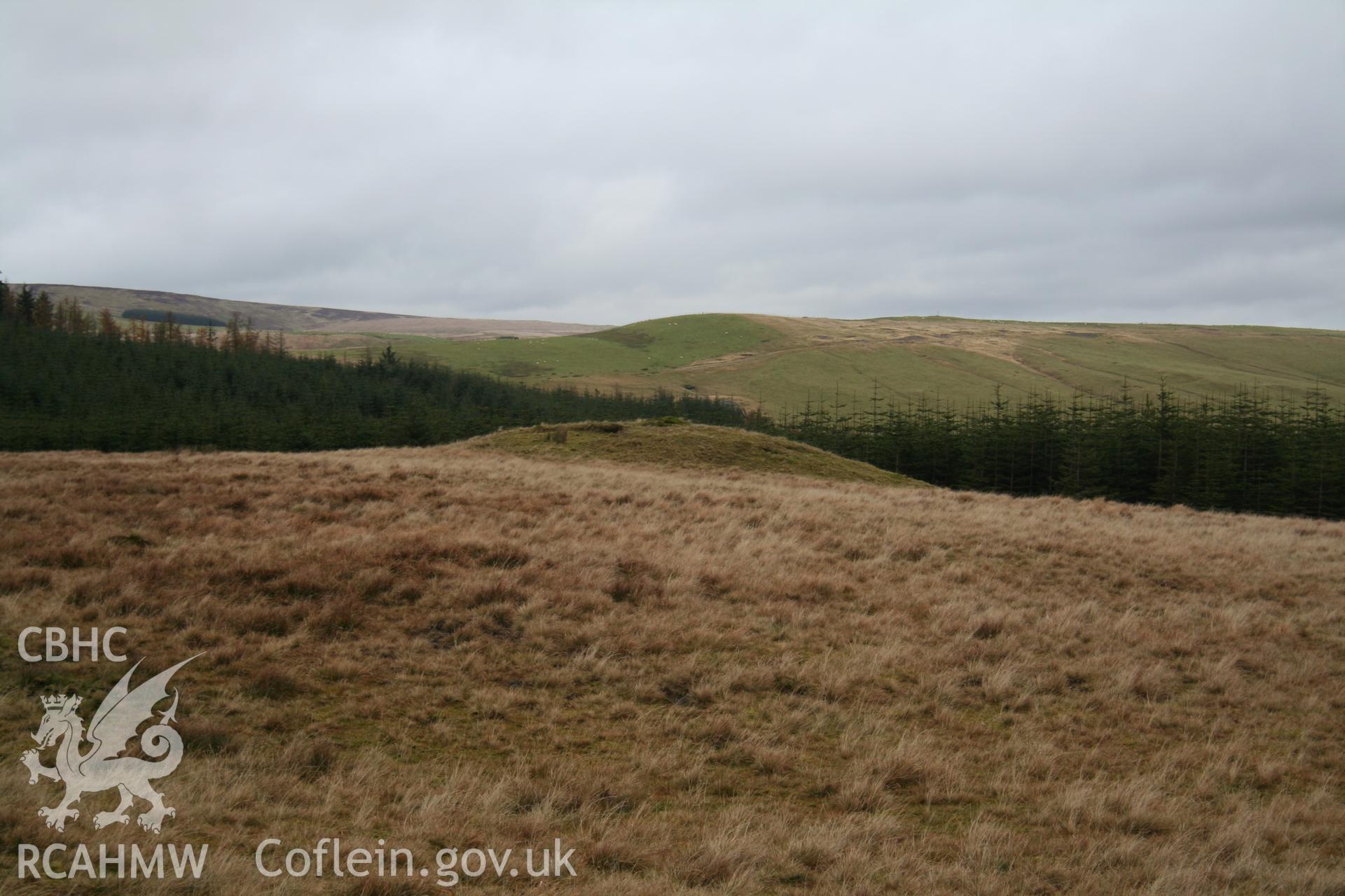 Landscape setting of barrow seen from the south-west.