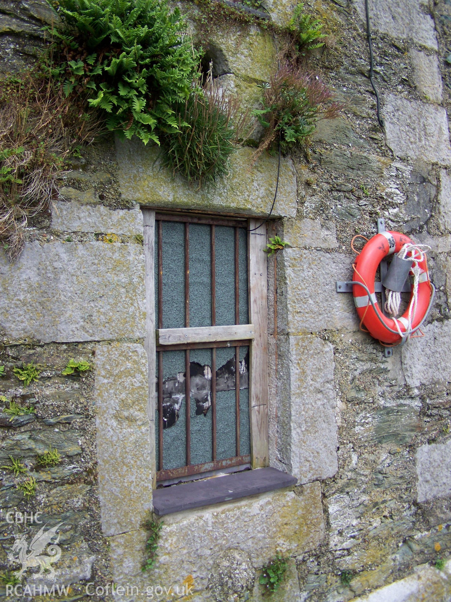 Detail of the stone dressing around the ground floor window of the lighthouse.