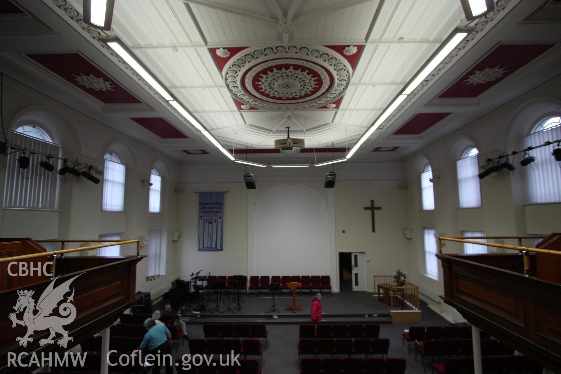 Interior view towards pulpit from gallery, showing ceiling