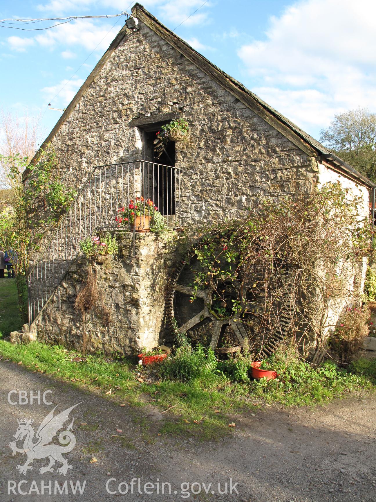 Outbuilding and old pit wheel at Llanvithyn Corn Mill.