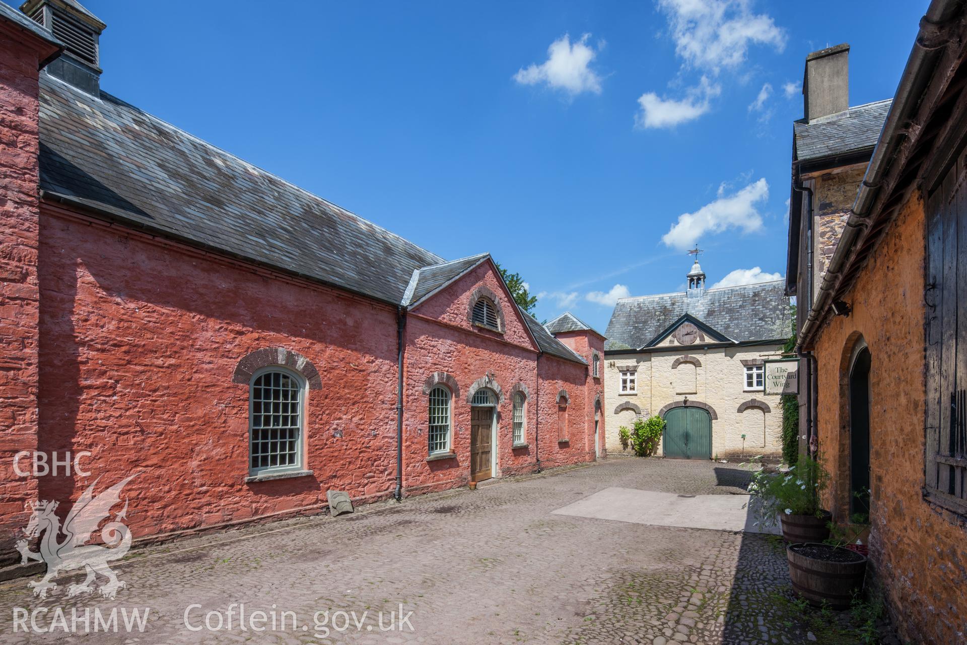 View of stables and coach house from the south southwest.