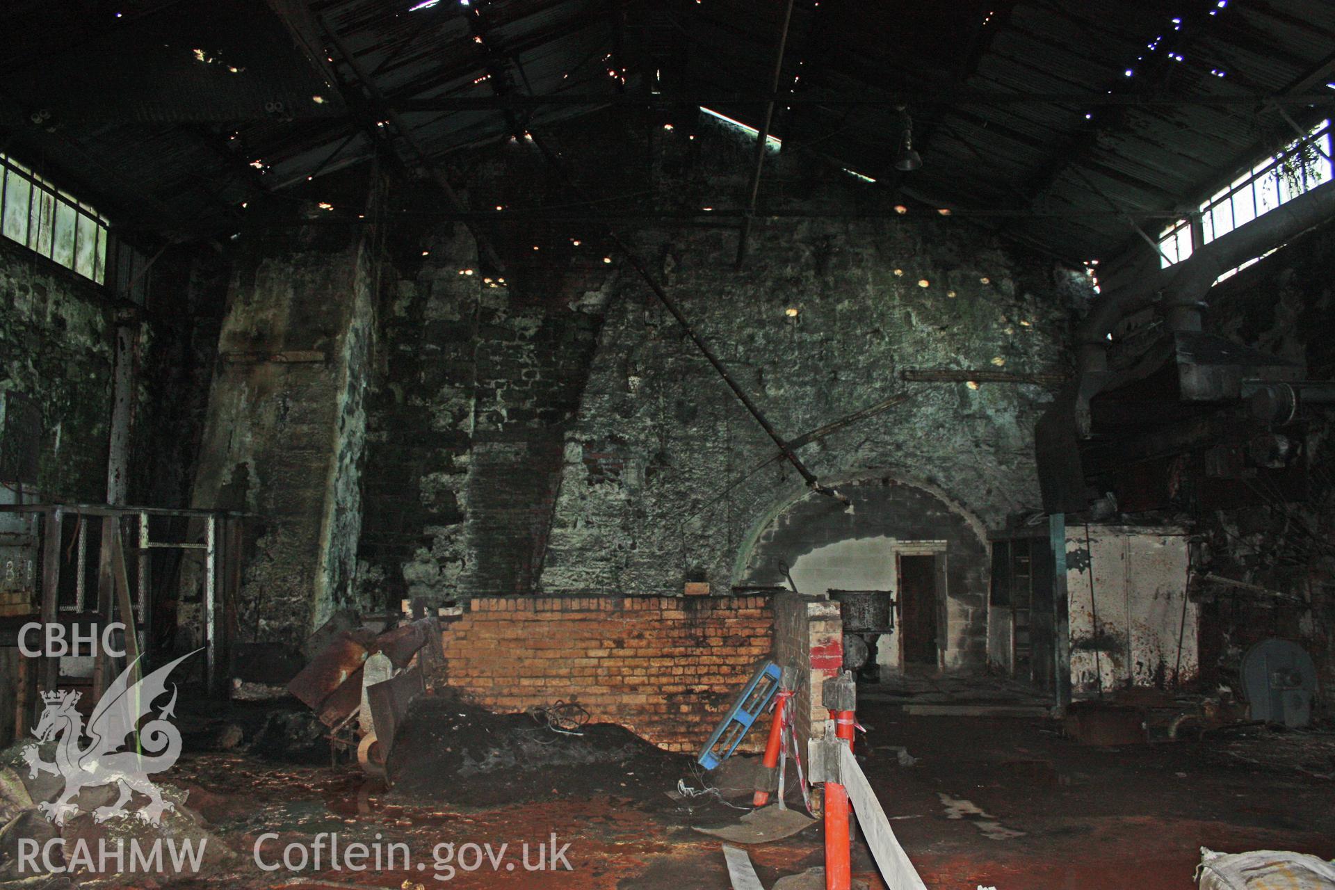 Internal, north internal elevation, showing blast furnace and chaging wall with buttress