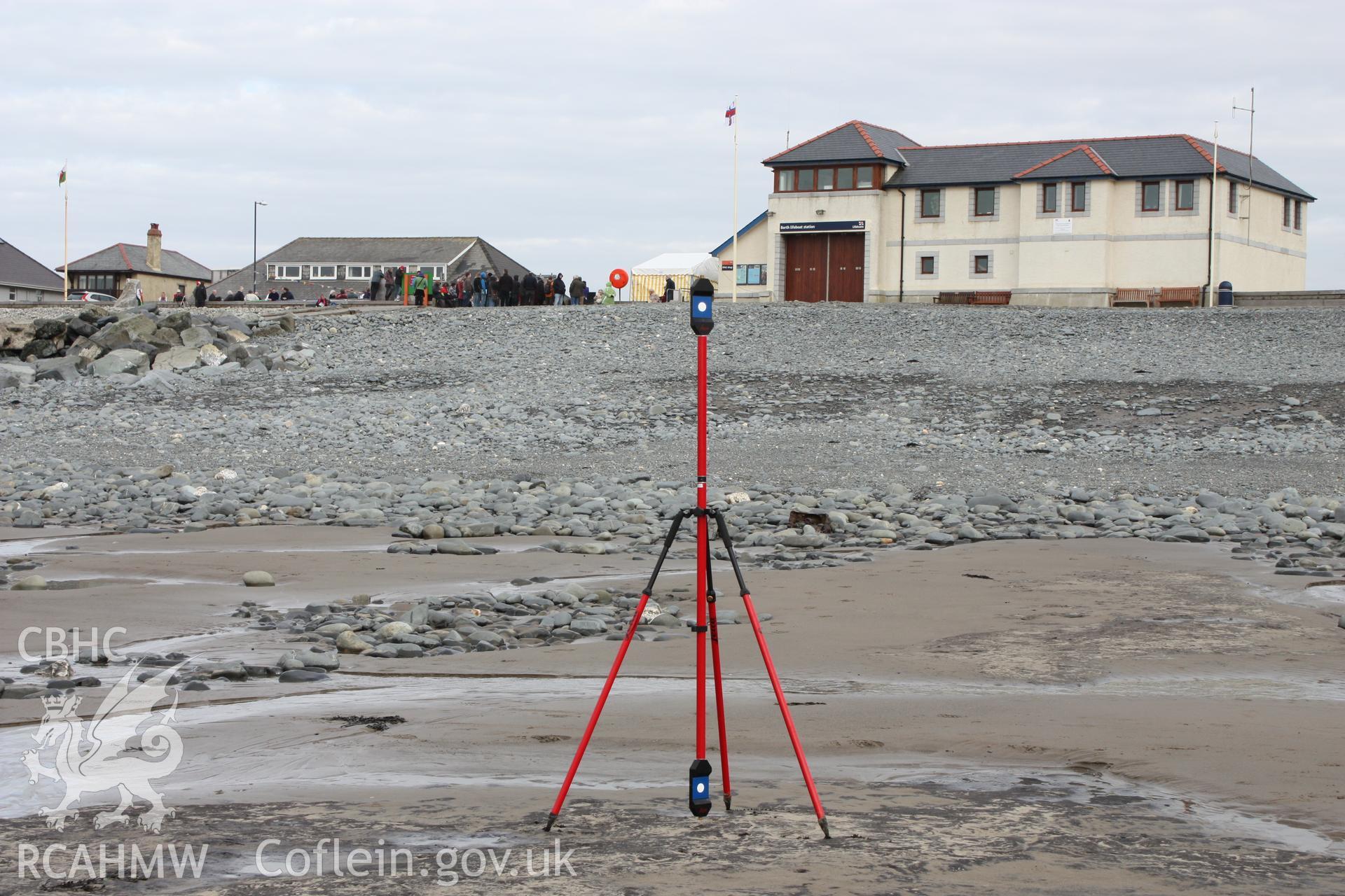 View from Borth submerged forest (between RNLI lifeboat station and upper Borth), looking east towards High Street and lifeboat station, showing eastern extremity of exposed peat deposits