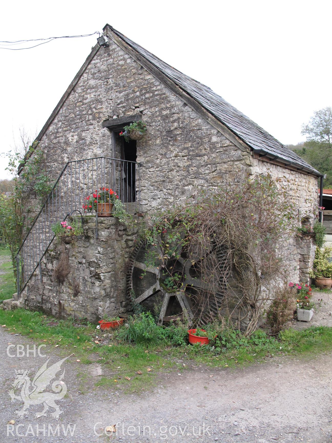 Outbuilding and old pit wheel at Llanvithyn Corn Mill.