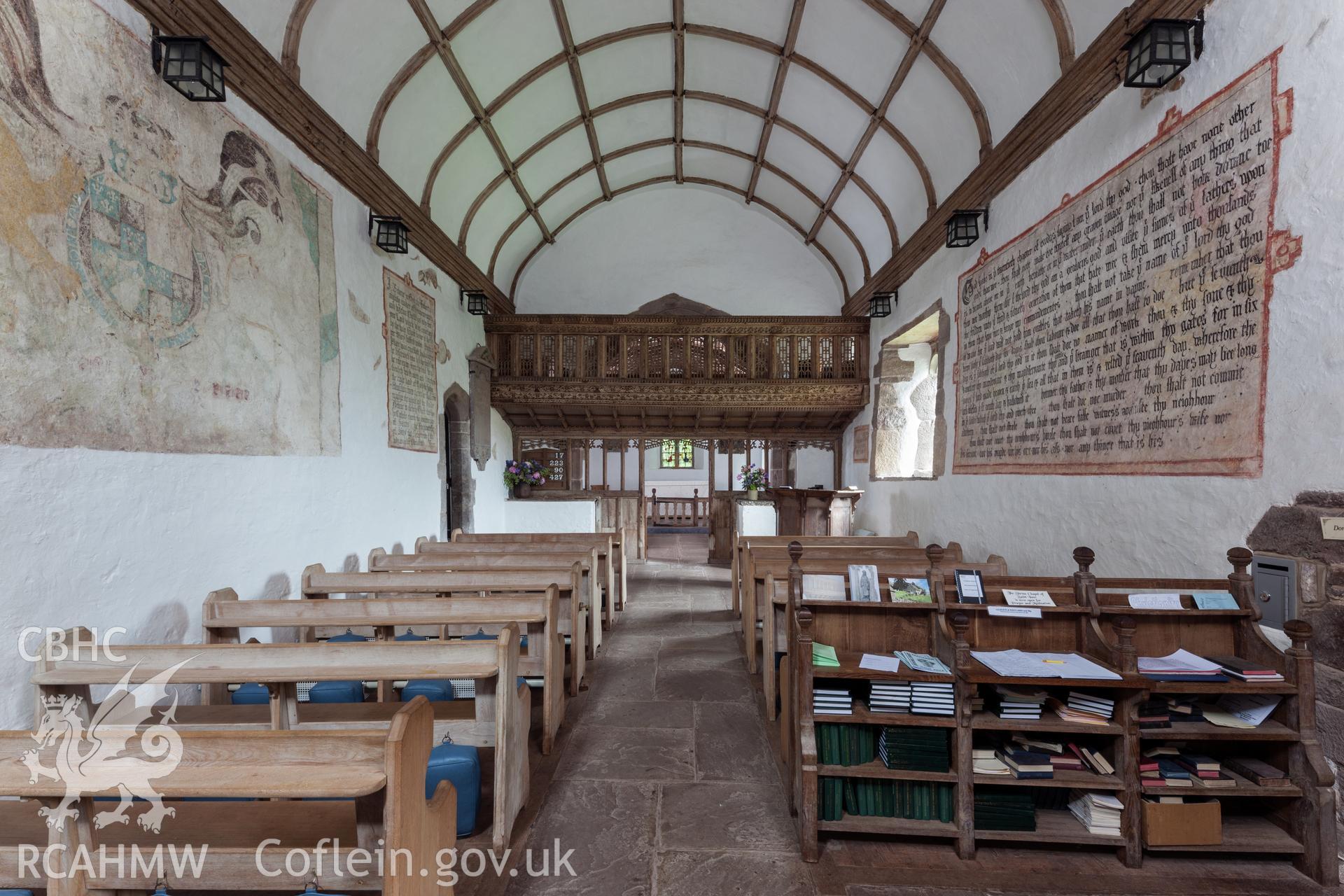 Interior From the east, chancel illuminated.