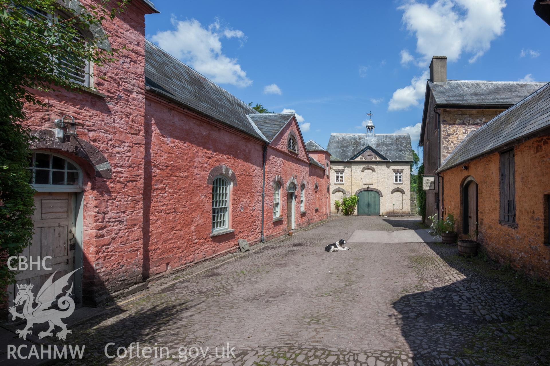 View of stables and coach house from the south southwest.