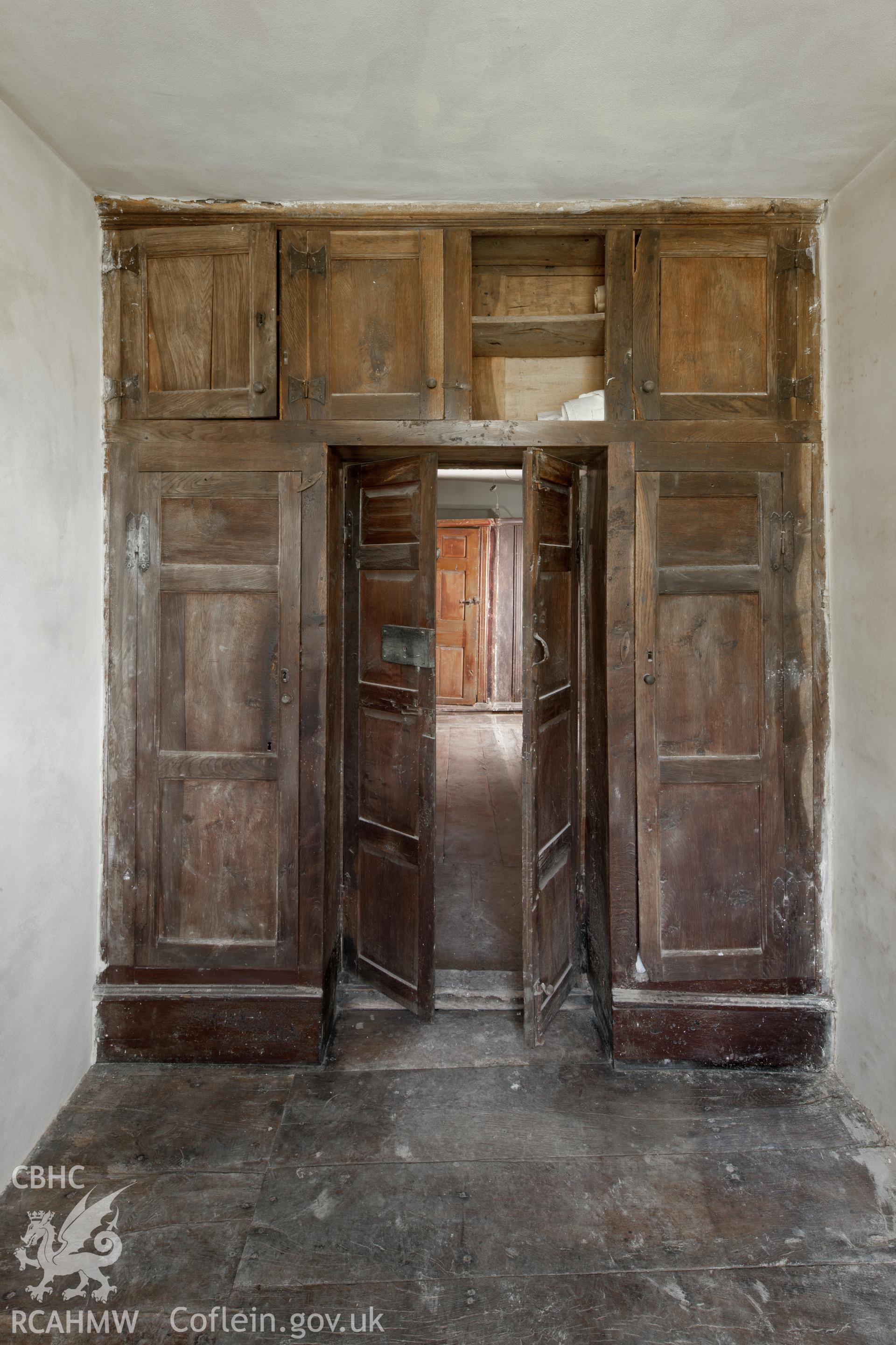 Porch, first floor, built in cupboards.