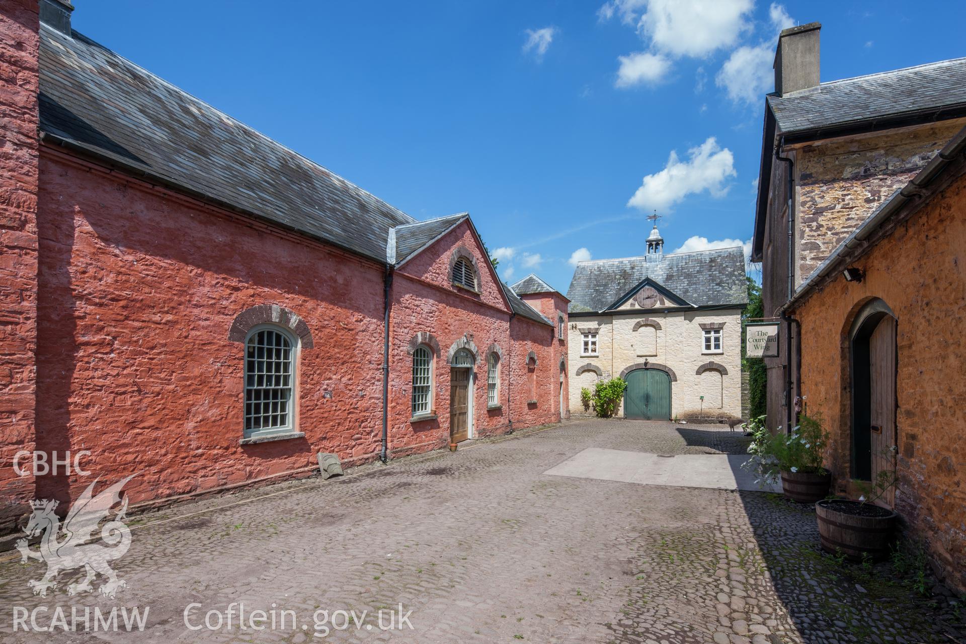 View of stables and coach house from the south southwest.