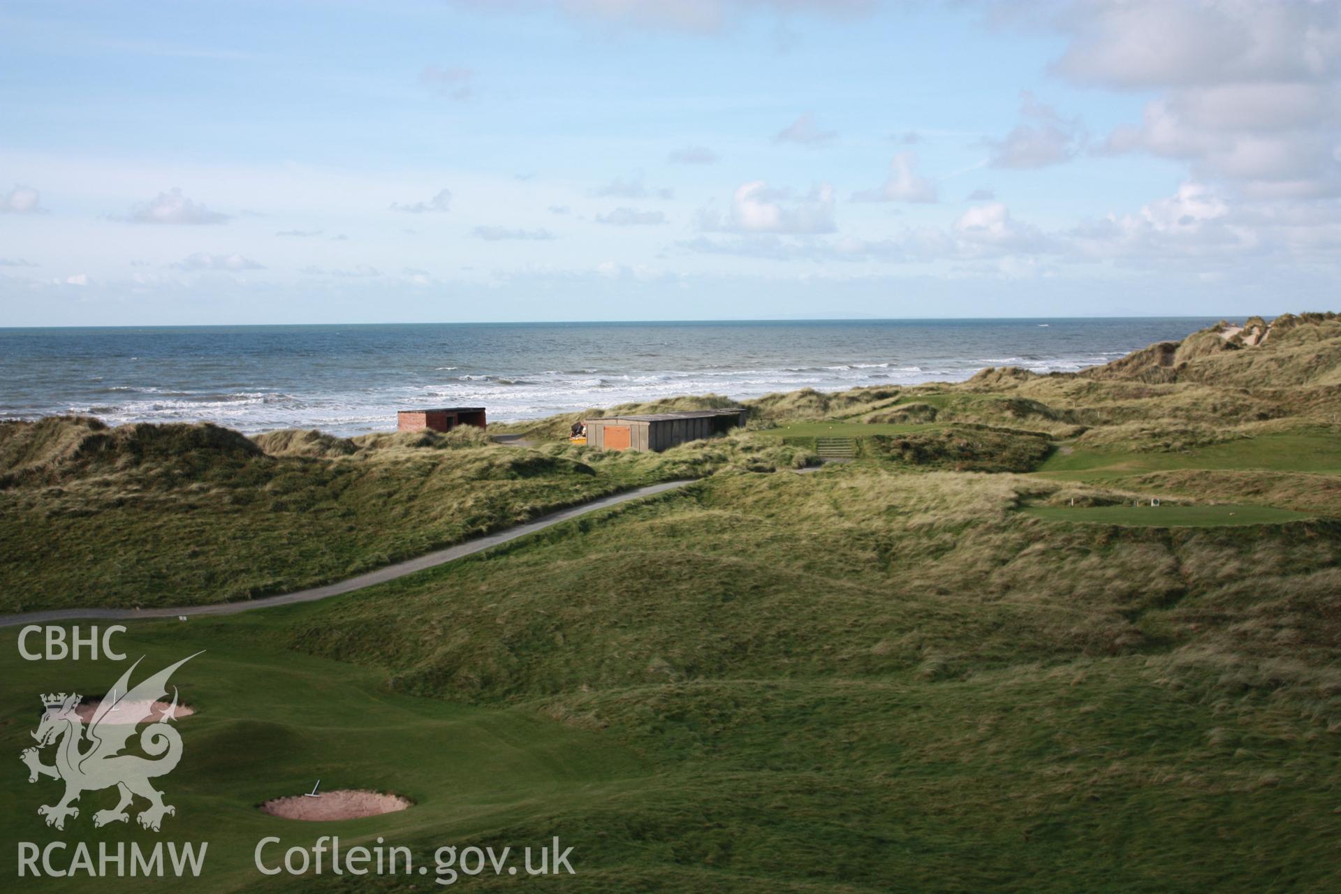 View of camera observation post and associated BCF hut (NRPNs 408402 and 506504) from rangerfinder (looking northwest)