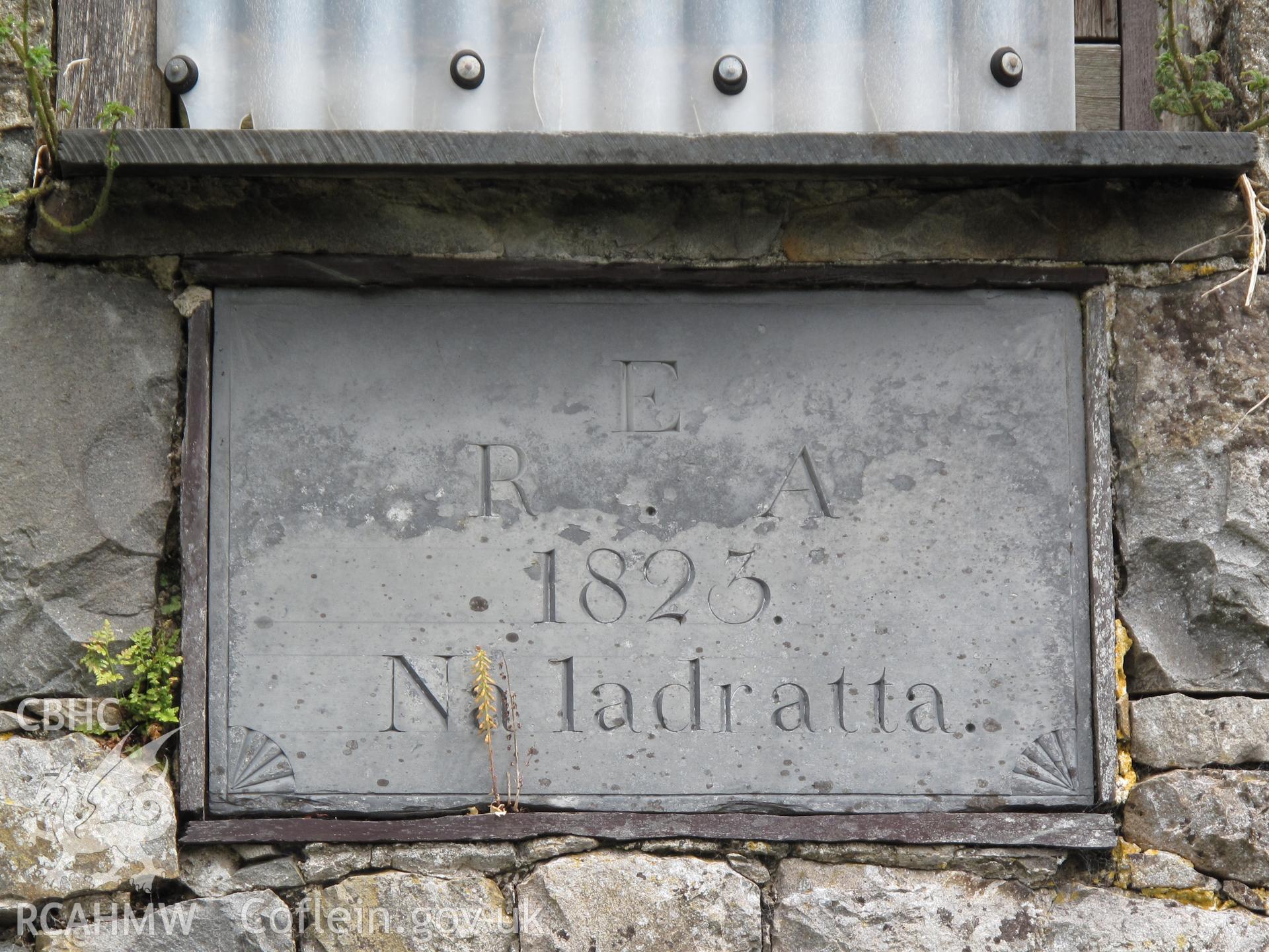 Detail of slate plaque over the door of the mill.