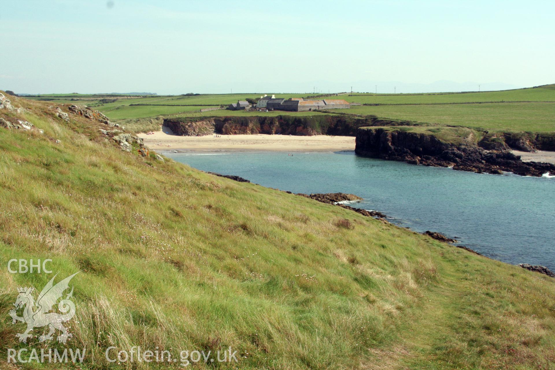 View of Porth Trecastell Bay to south of Barclodiad y Gawres.