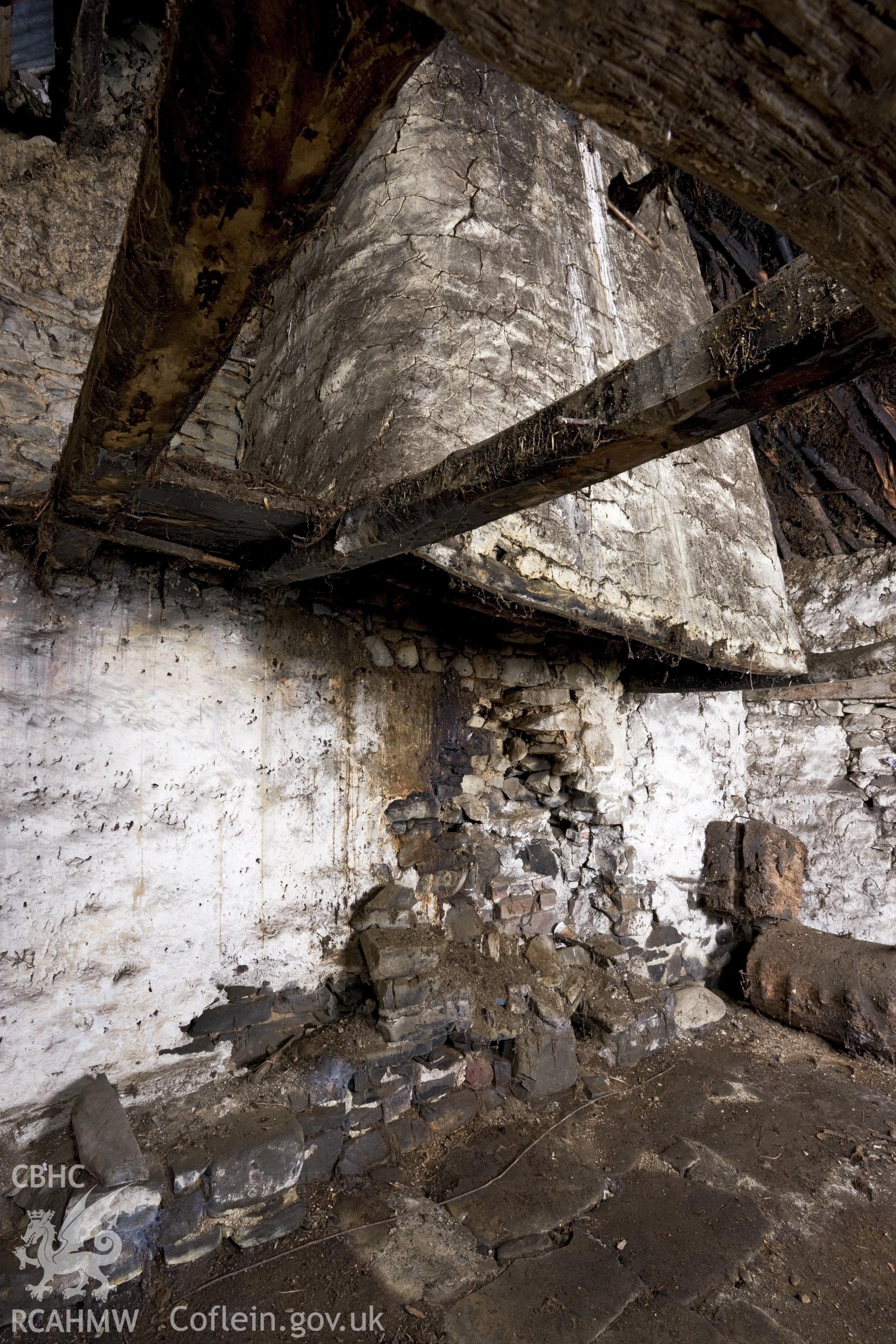 Interior view of Wigwen Fach showing the wicker fireplace hood.