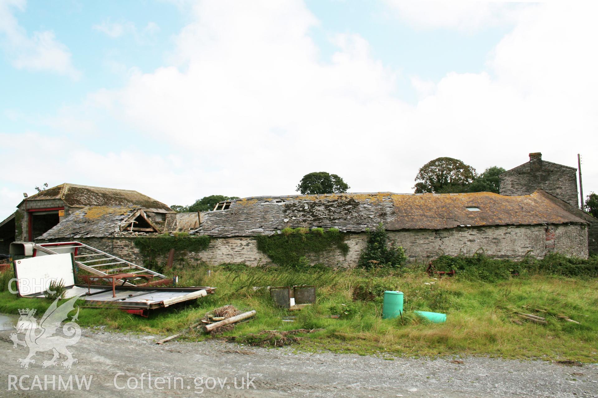 View of semi-circular cattle shelter from the west.