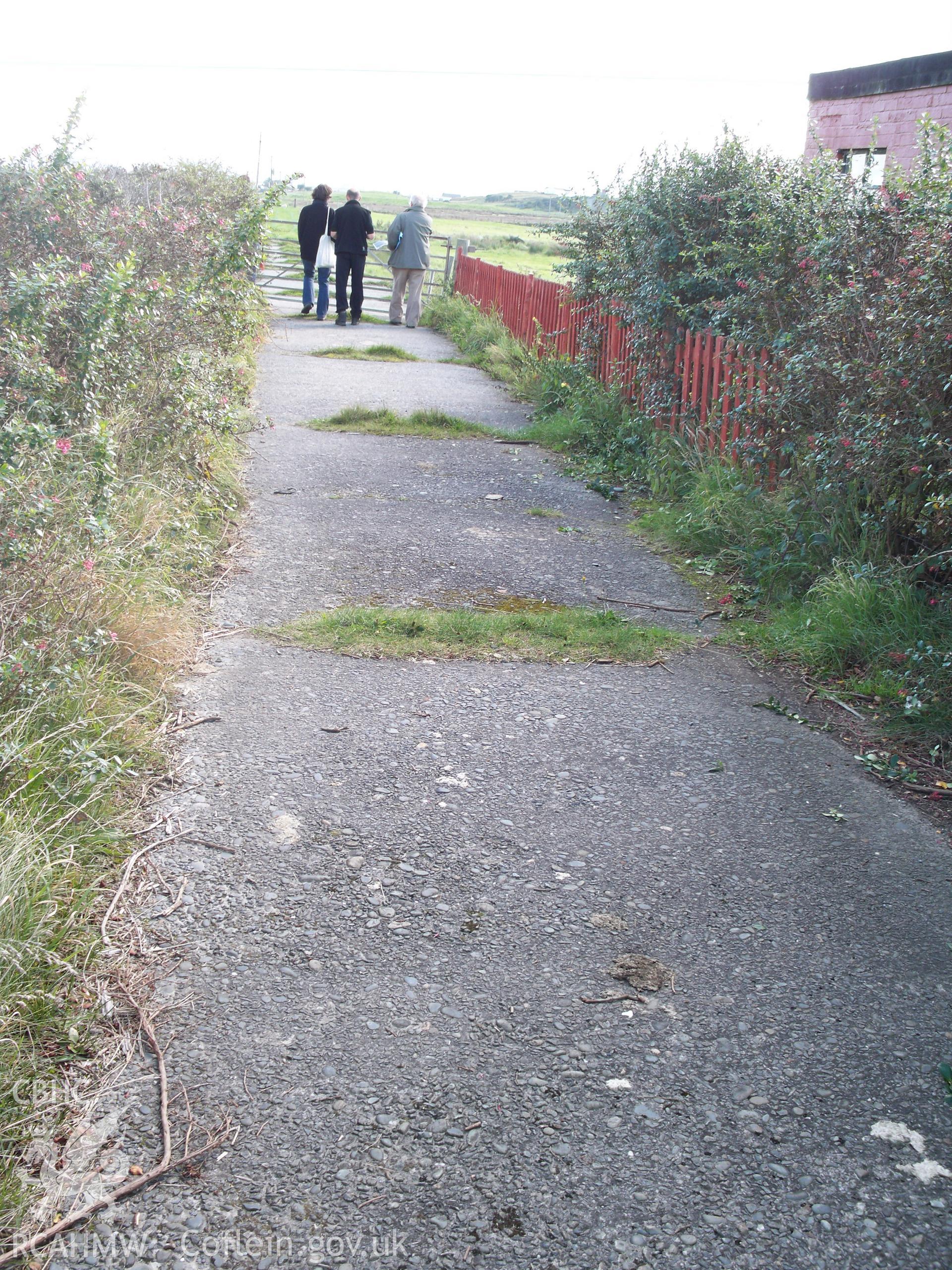 Access track looking east with RCAHMW staff members