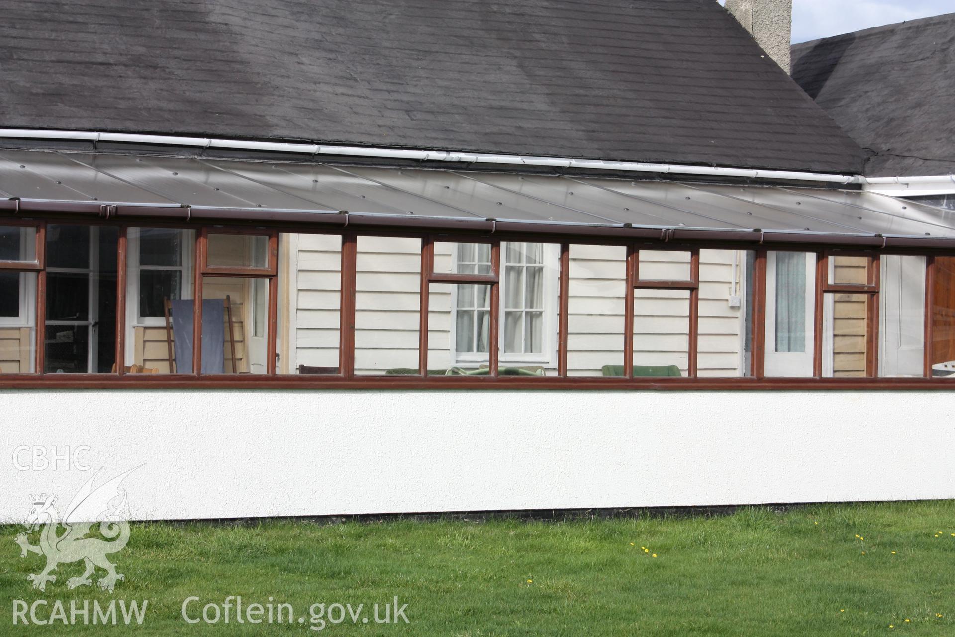 Timber cladding viewed through sunlounge extension