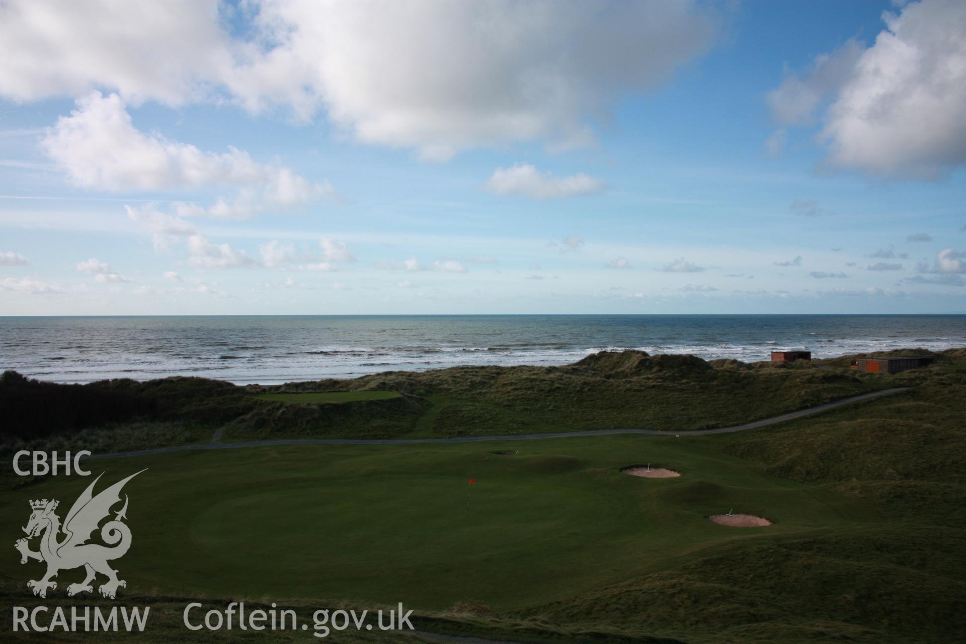 View out to sea from rangefinder across Ynyslas golf course with camera observation post to righthand side