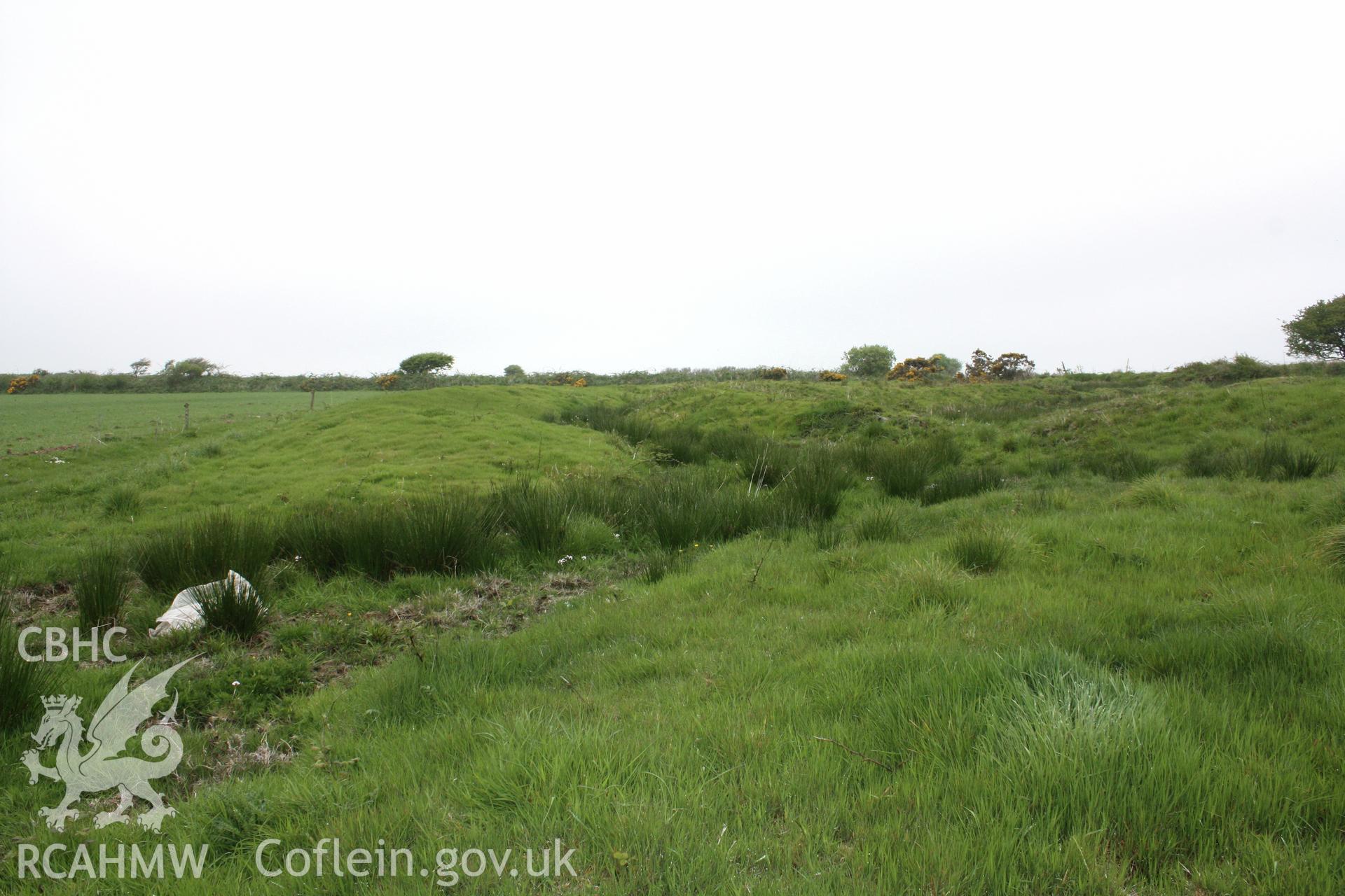 Castell Cwm-wyntell.  Looking north-east at the later drainage ditch cutting across both enclosure banks.