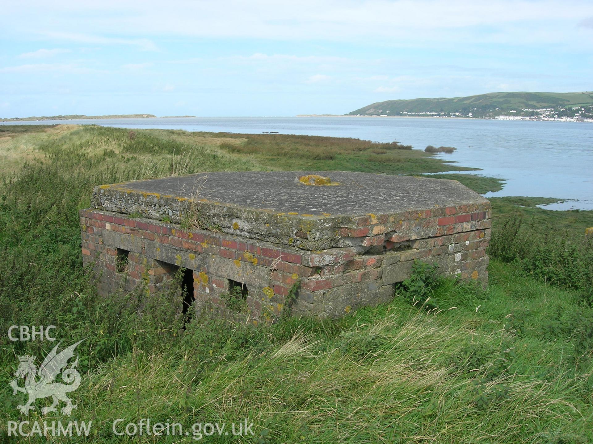 View of pillbox from east showing broken off concrete plinth for rangefinder on roof