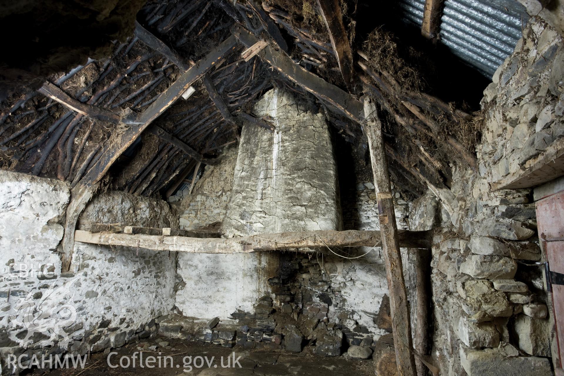 Interior view of Wigwen Fach showing the wicker fireplace hood.