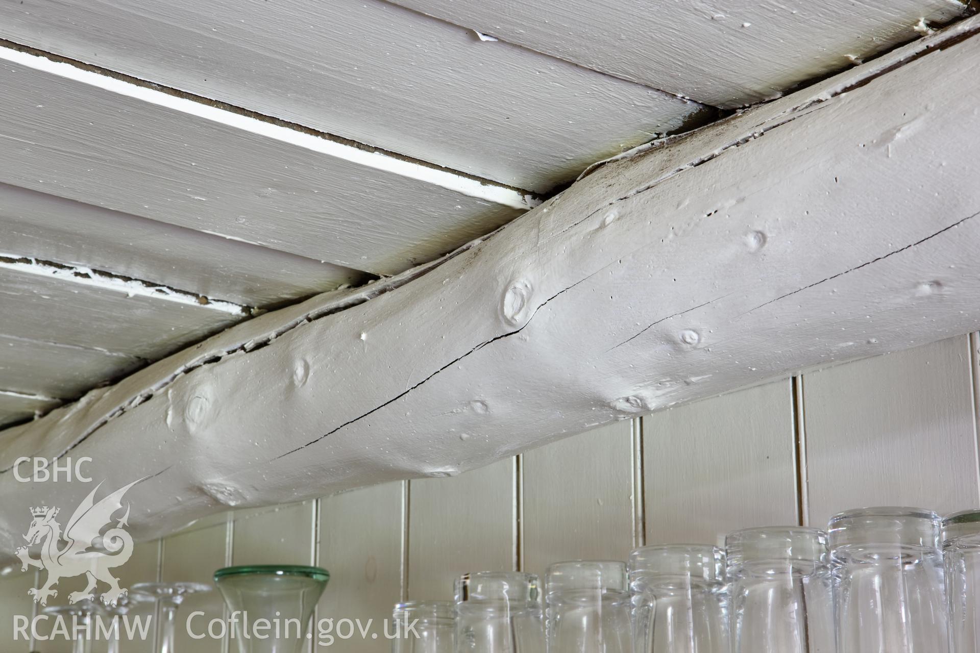 Round pole ceiling beam.