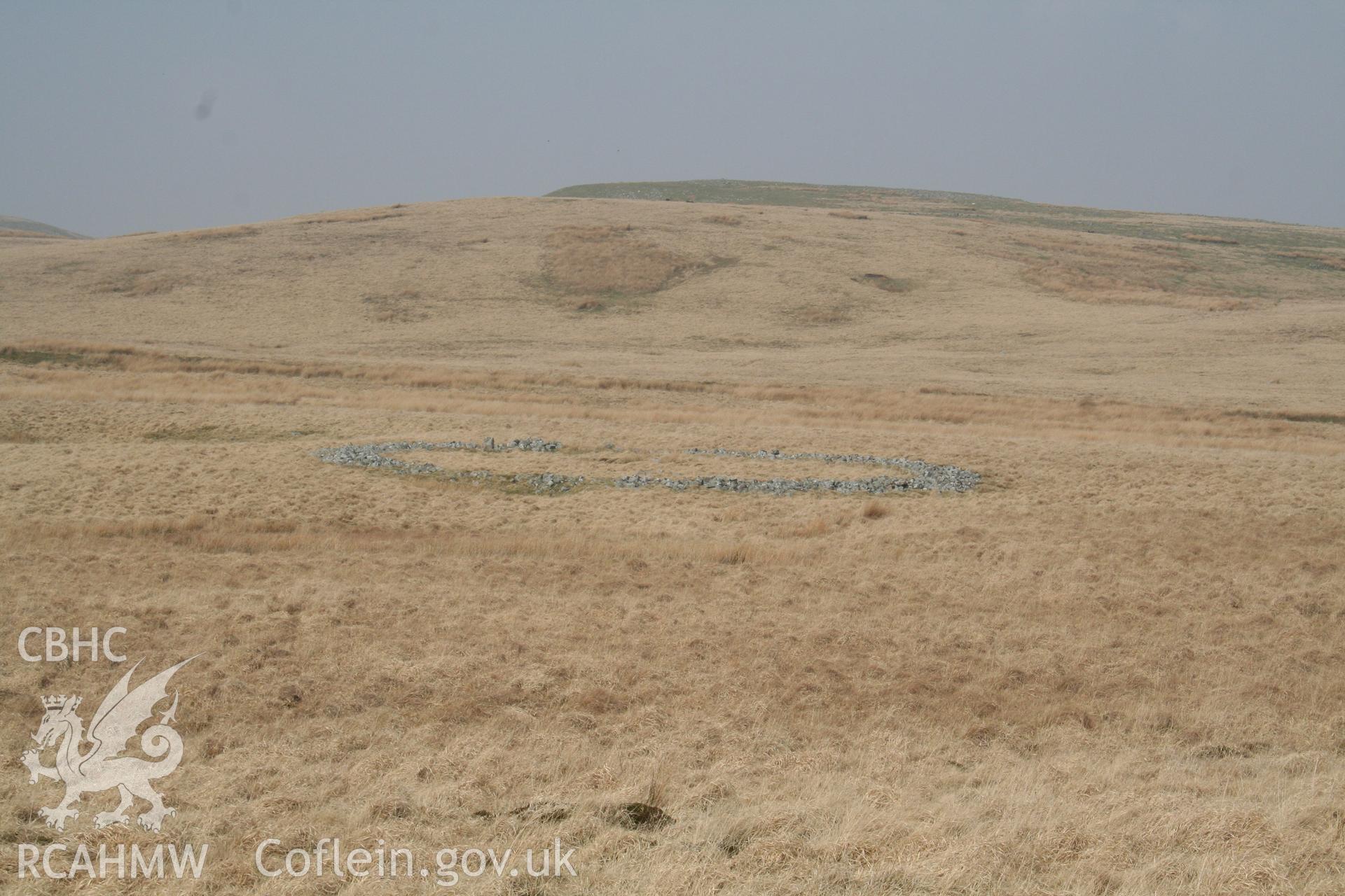 Distant view of ring cairn seen from the south.