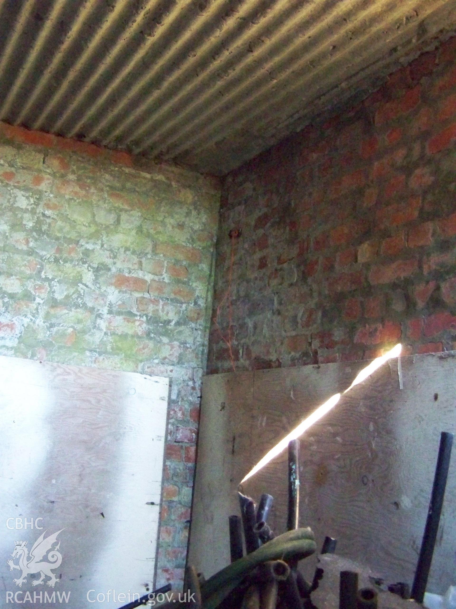 Interior of structure showing underside of concrete roof