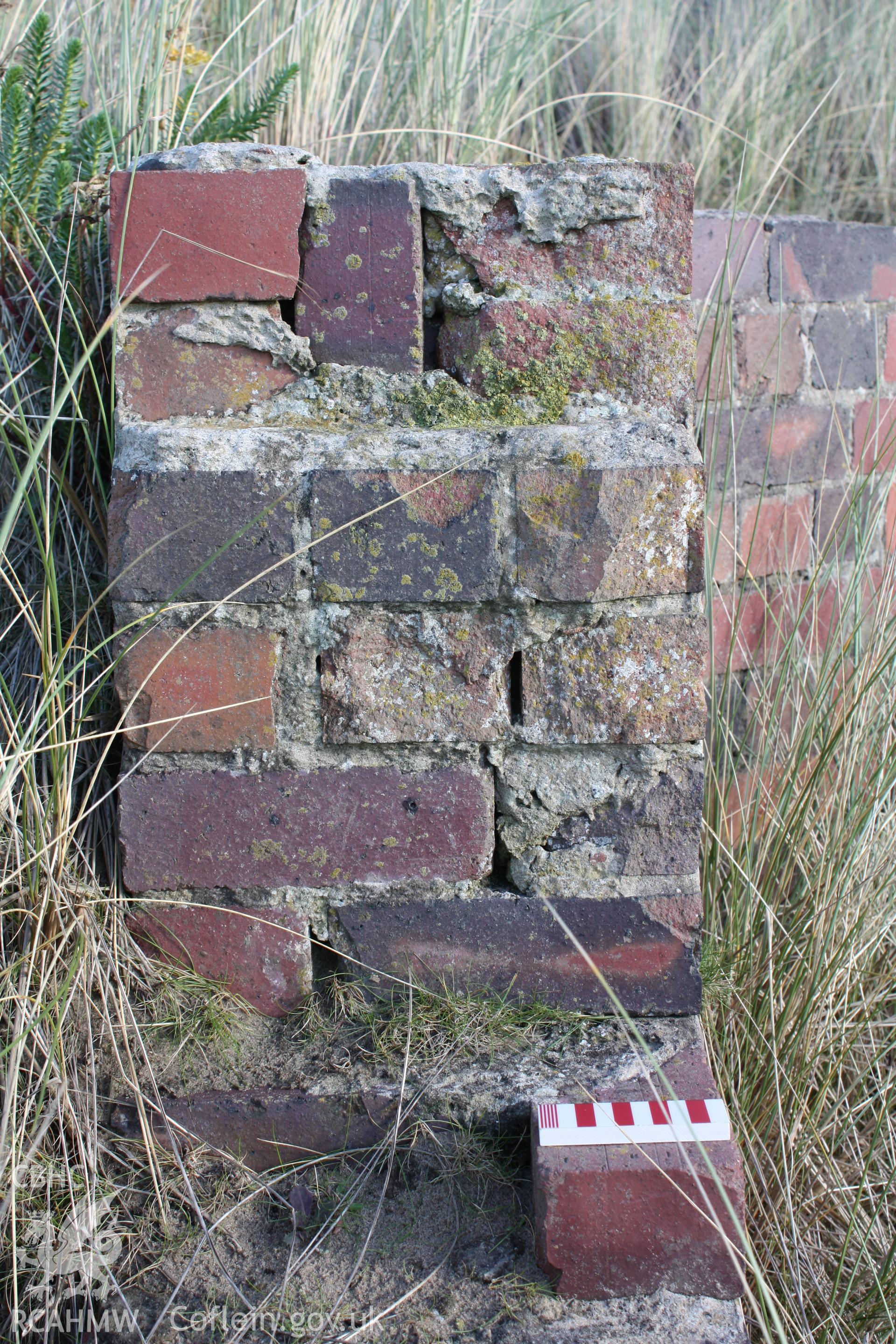 Detail of construction of extant wall from edge of a firing position/slot with photoscale