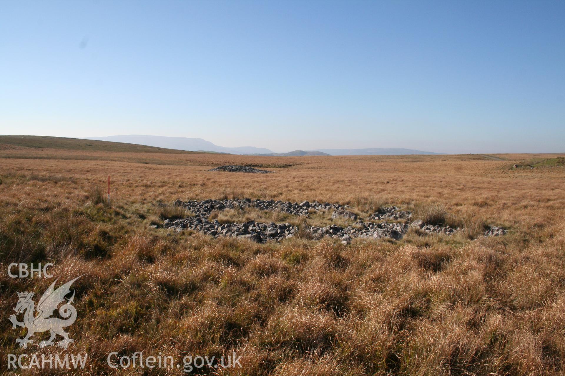 Cairn viewed from the north-east; 1m scale. Cairn NPRN 84639 in the background.