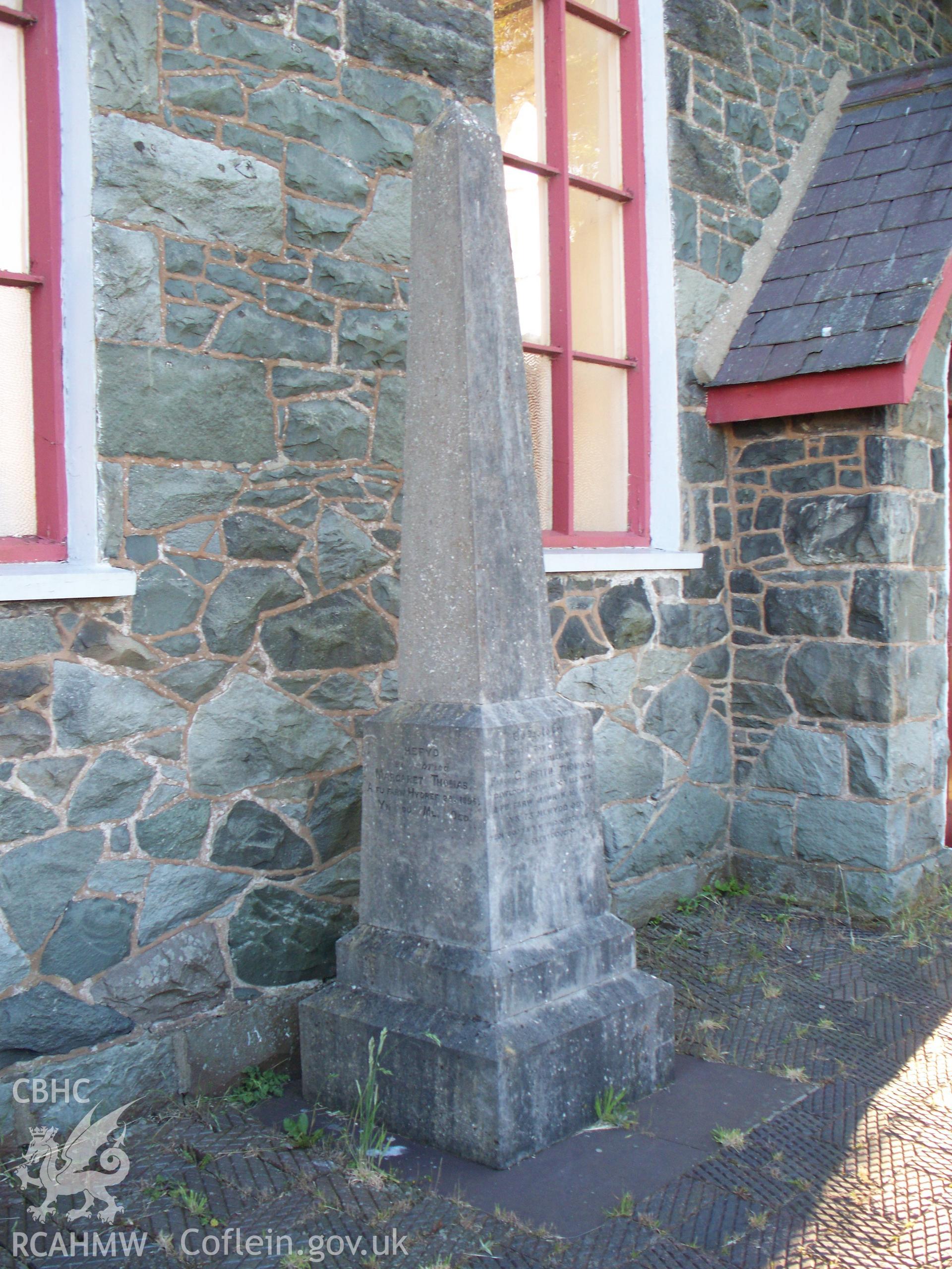 Monument in fornt of chapel.