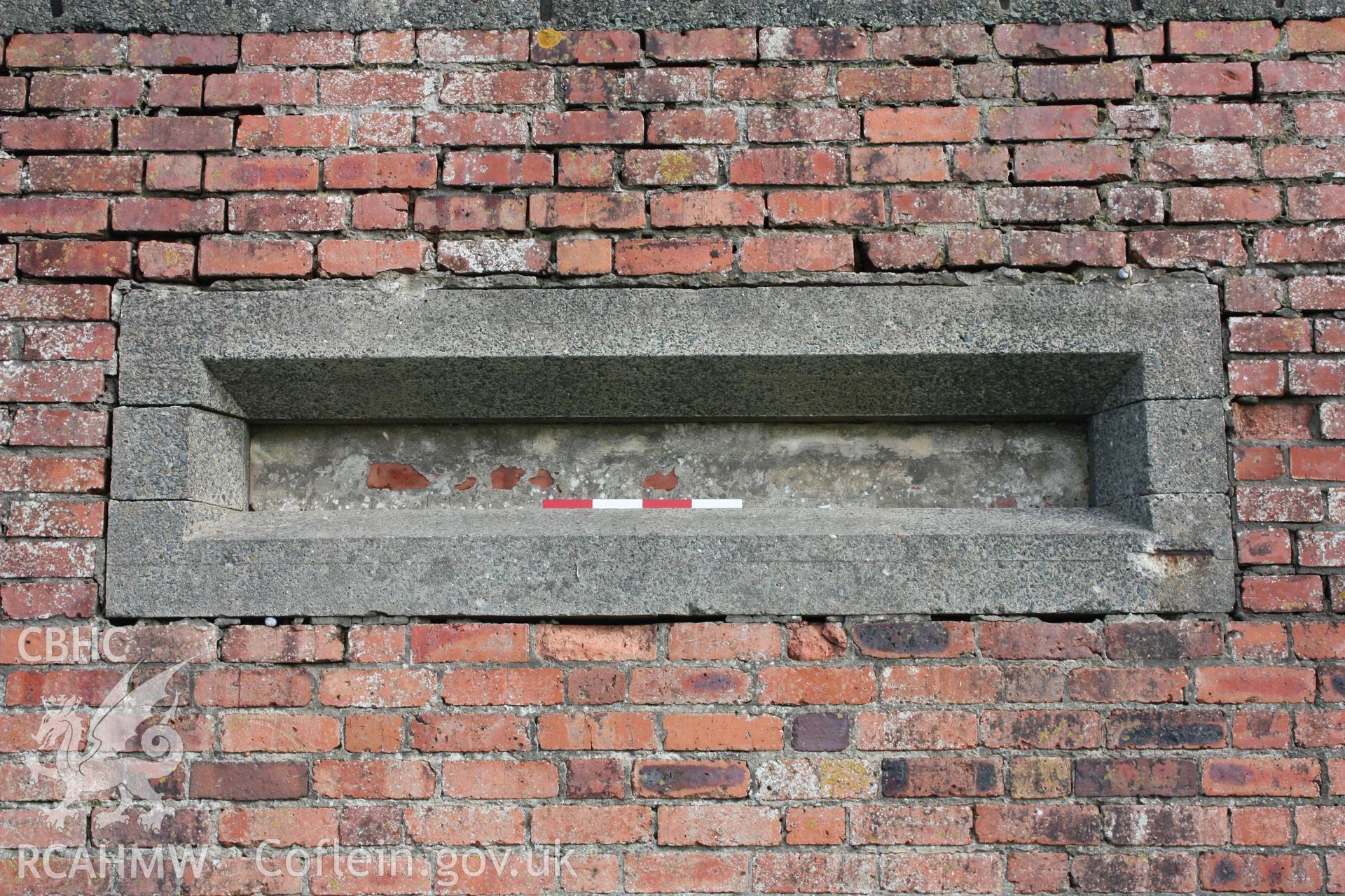 Bricked up observation slit in seaward facade with photoscale