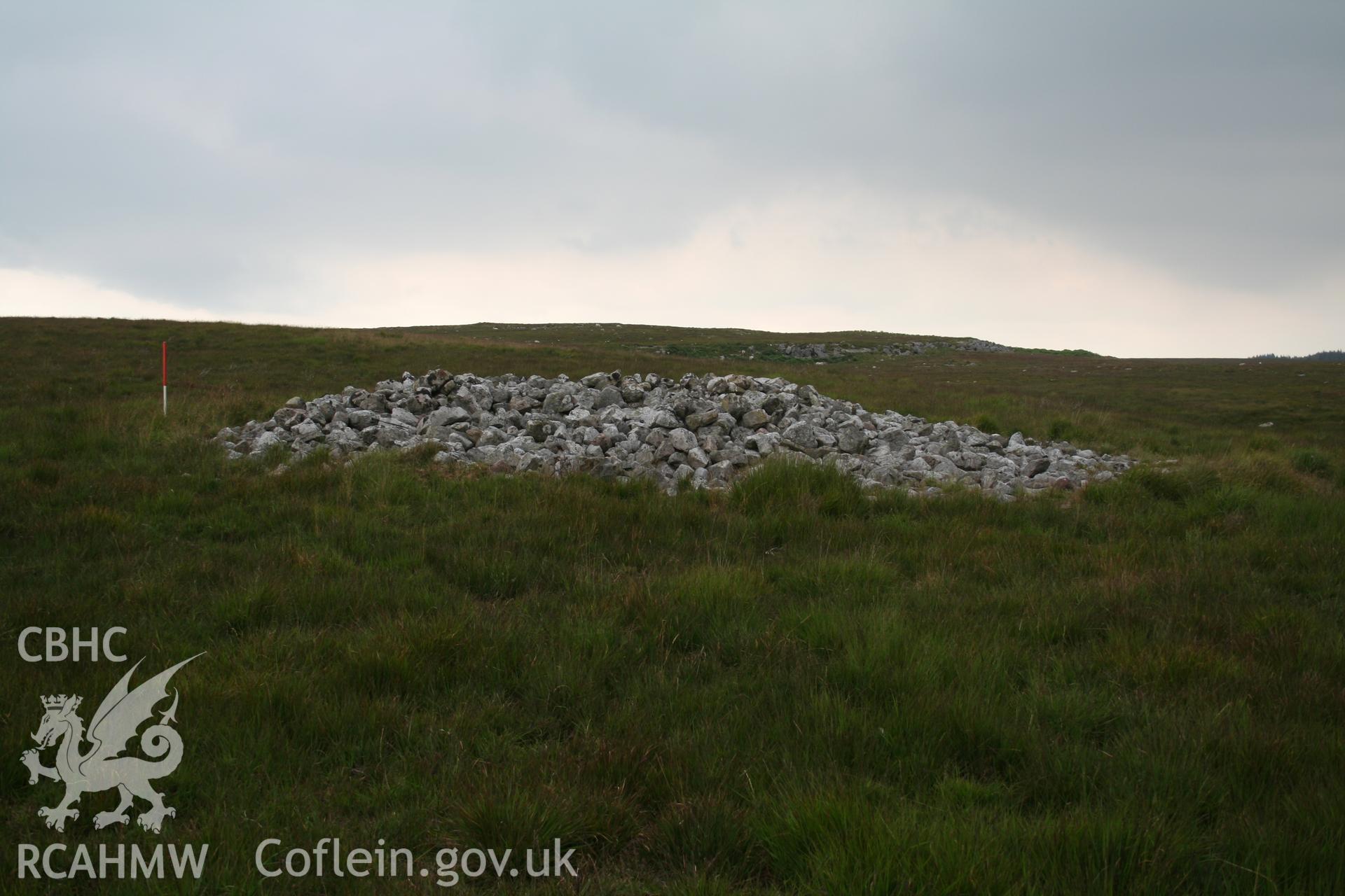 View of cairn from the south-west; 1m scale.