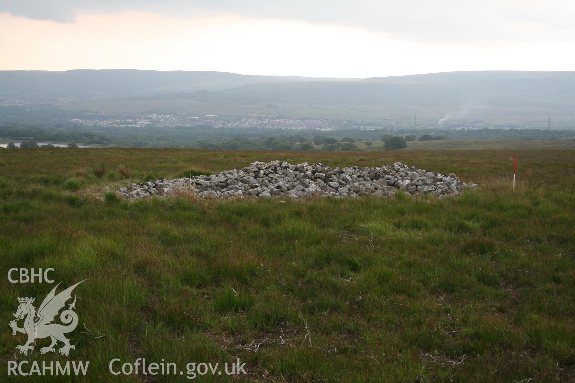 View of cairn from the north-east; 1m scale.