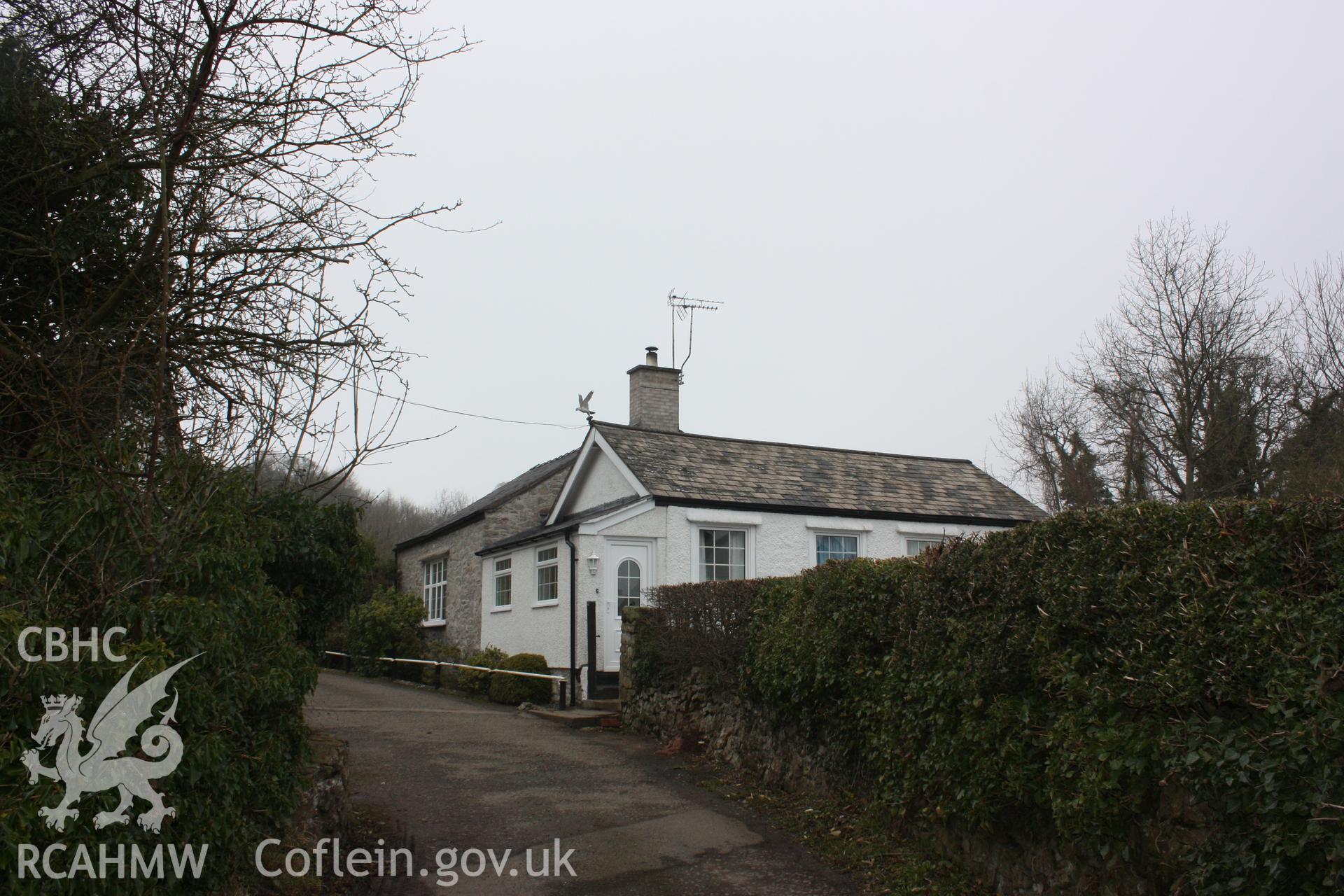 A nineteenth century building by the side of a road leading from former quarry offices and into modern-day Froncysyllte.