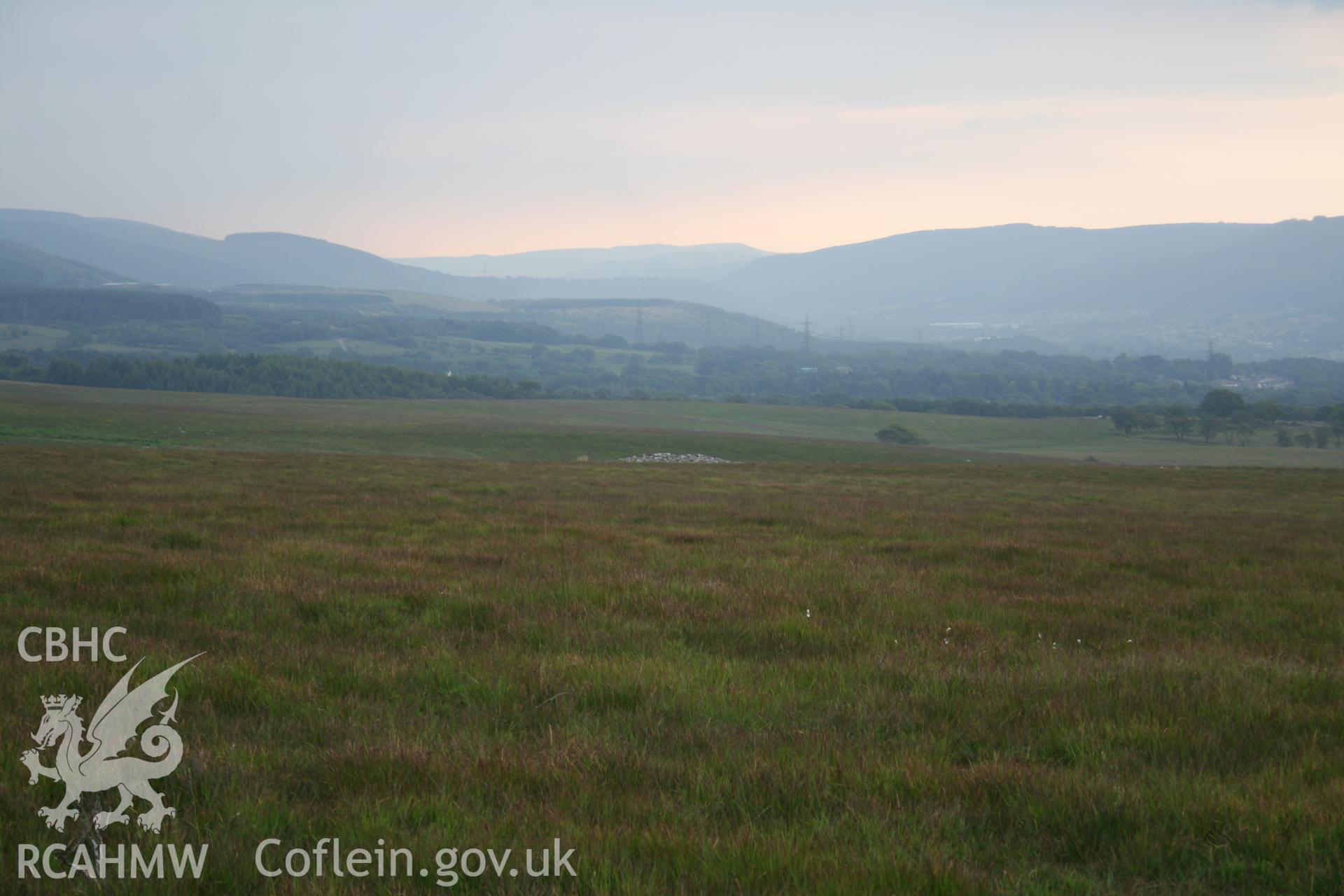 Distant view of cairn from the north-west.