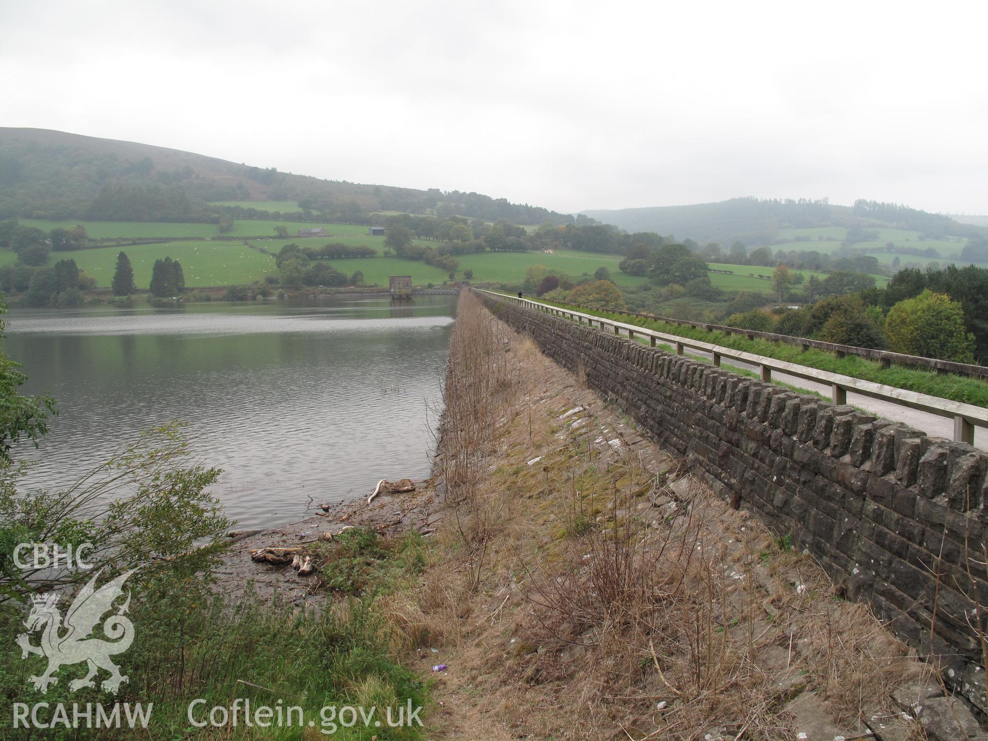 View along the dam, Talybont Water Scheme, from the southeast, taken by Brian Malaws on 08 October 2010.