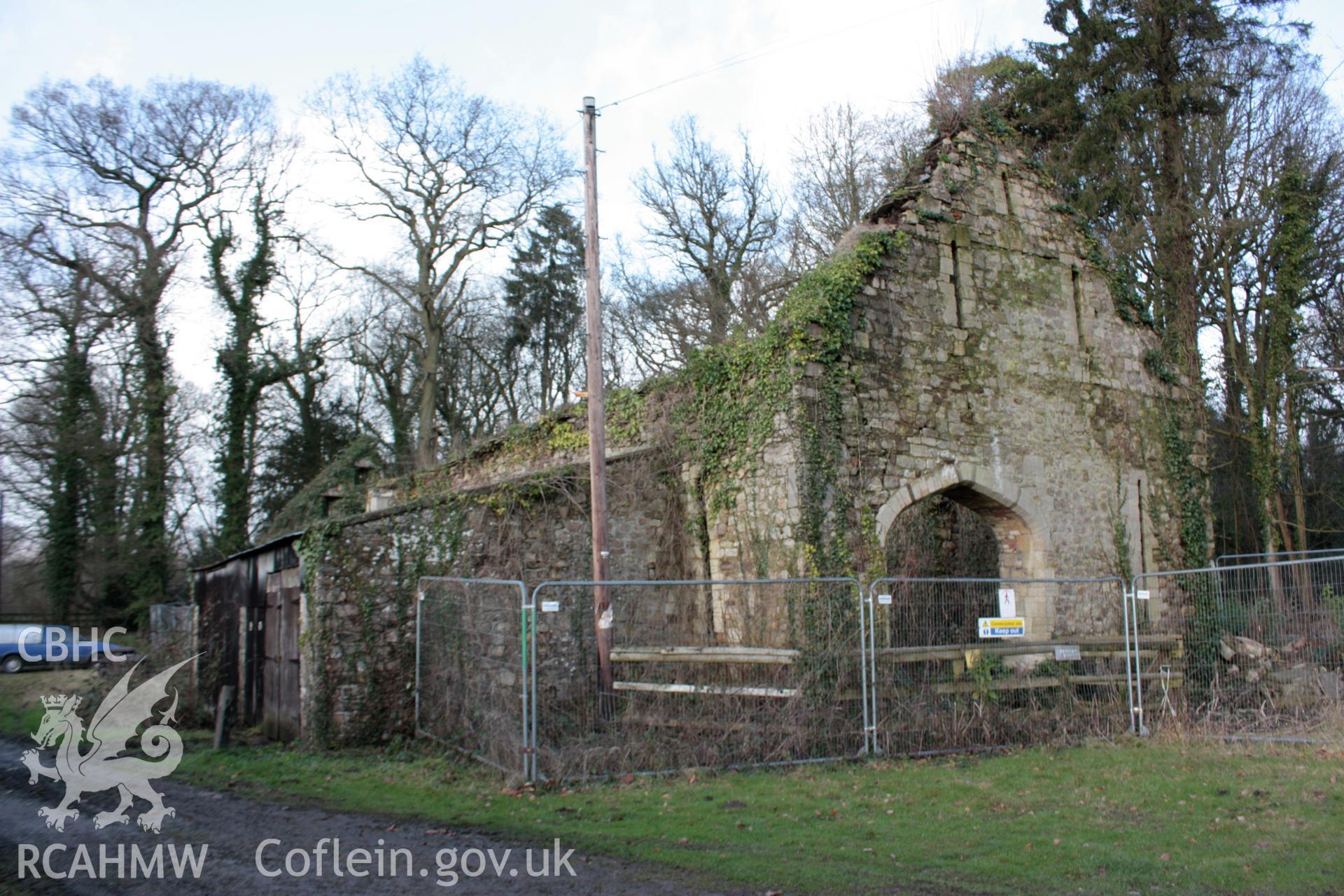 External; 3/4 view of east gable and south elevation