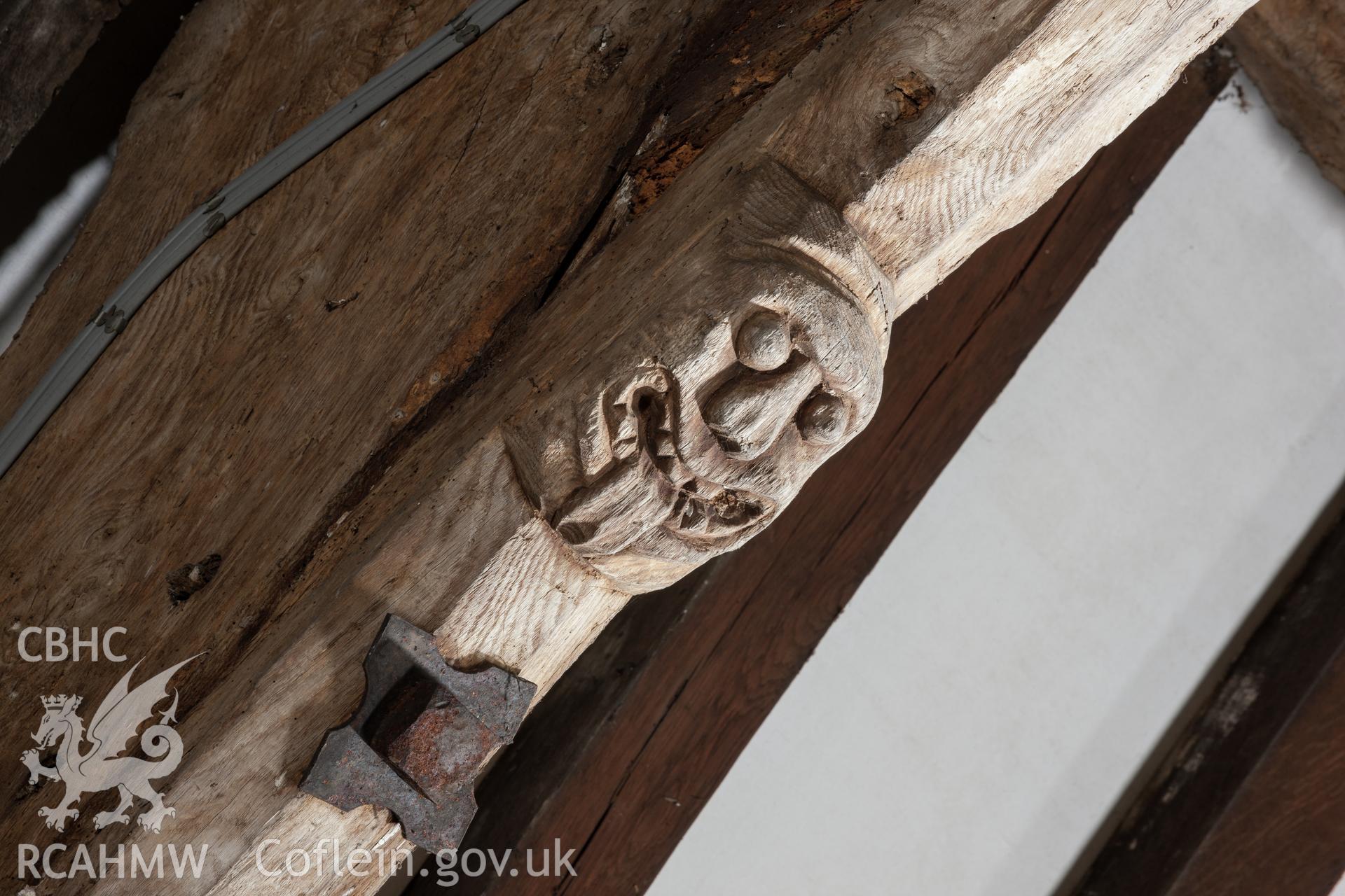 Carved head on sixth truss