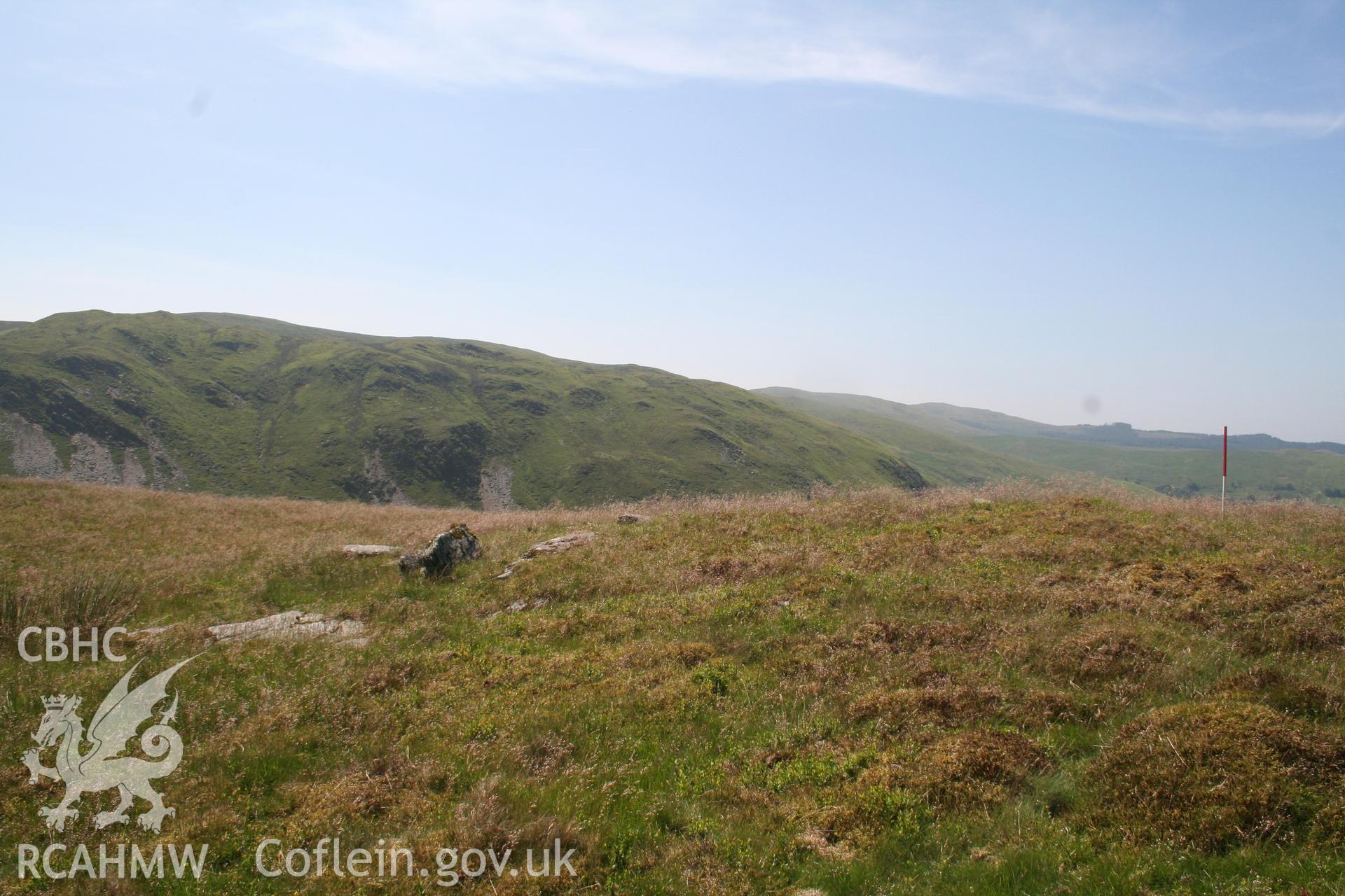 Cairn viewed from the north-east; 1m scale.