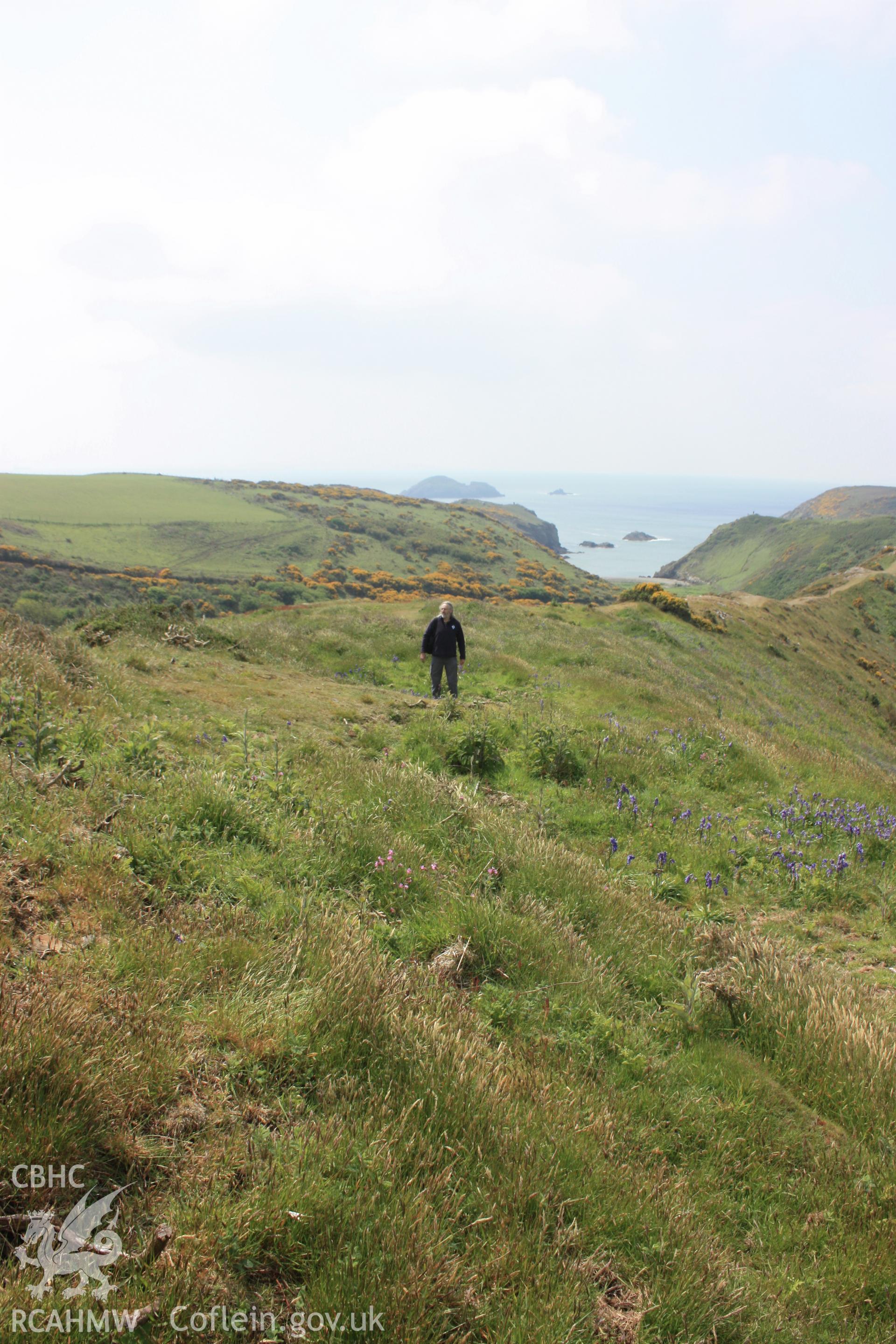 View looking south-west across a series of hut platforms within the fort.