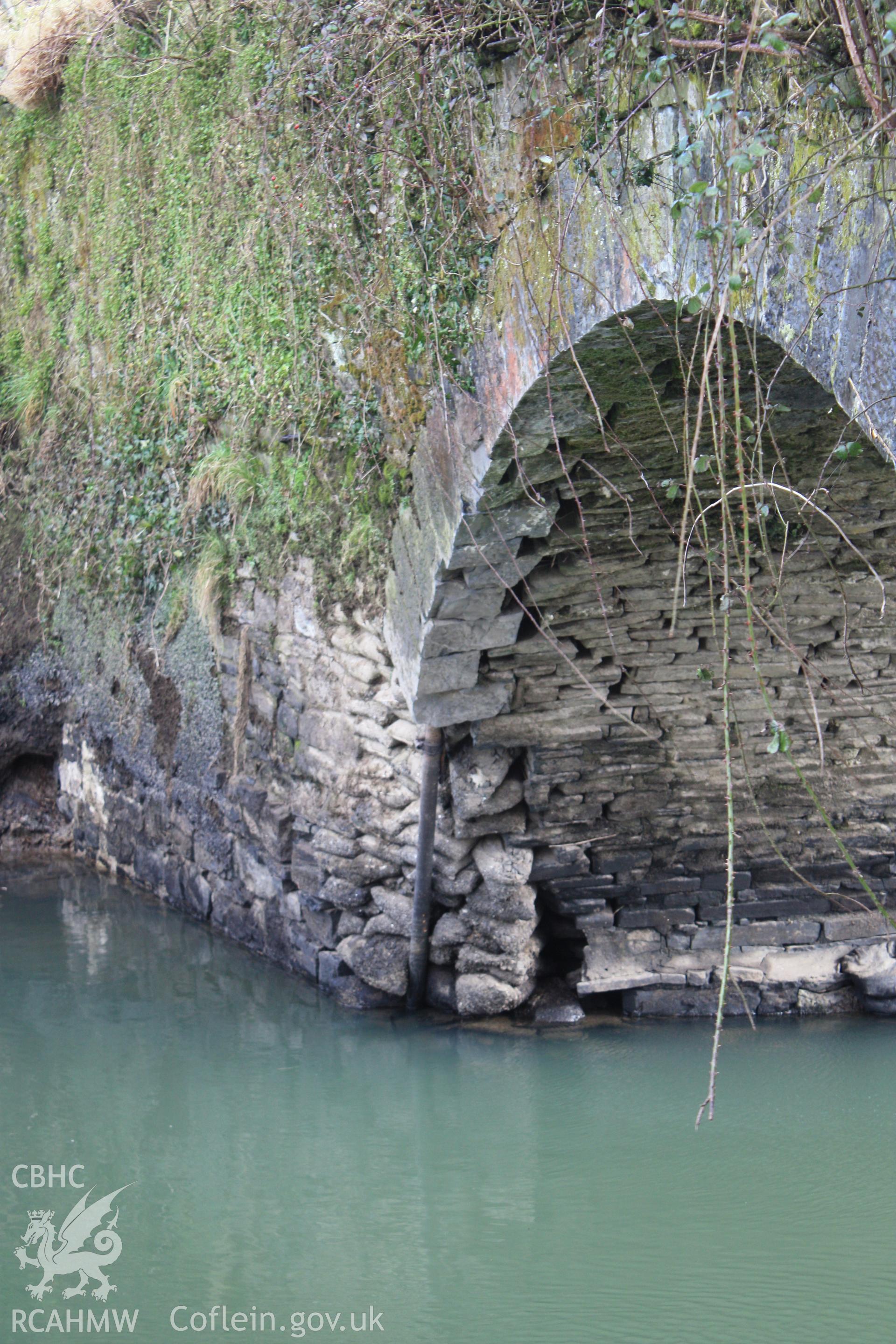 North elevation; earlier repair work to east side of arch and abutment