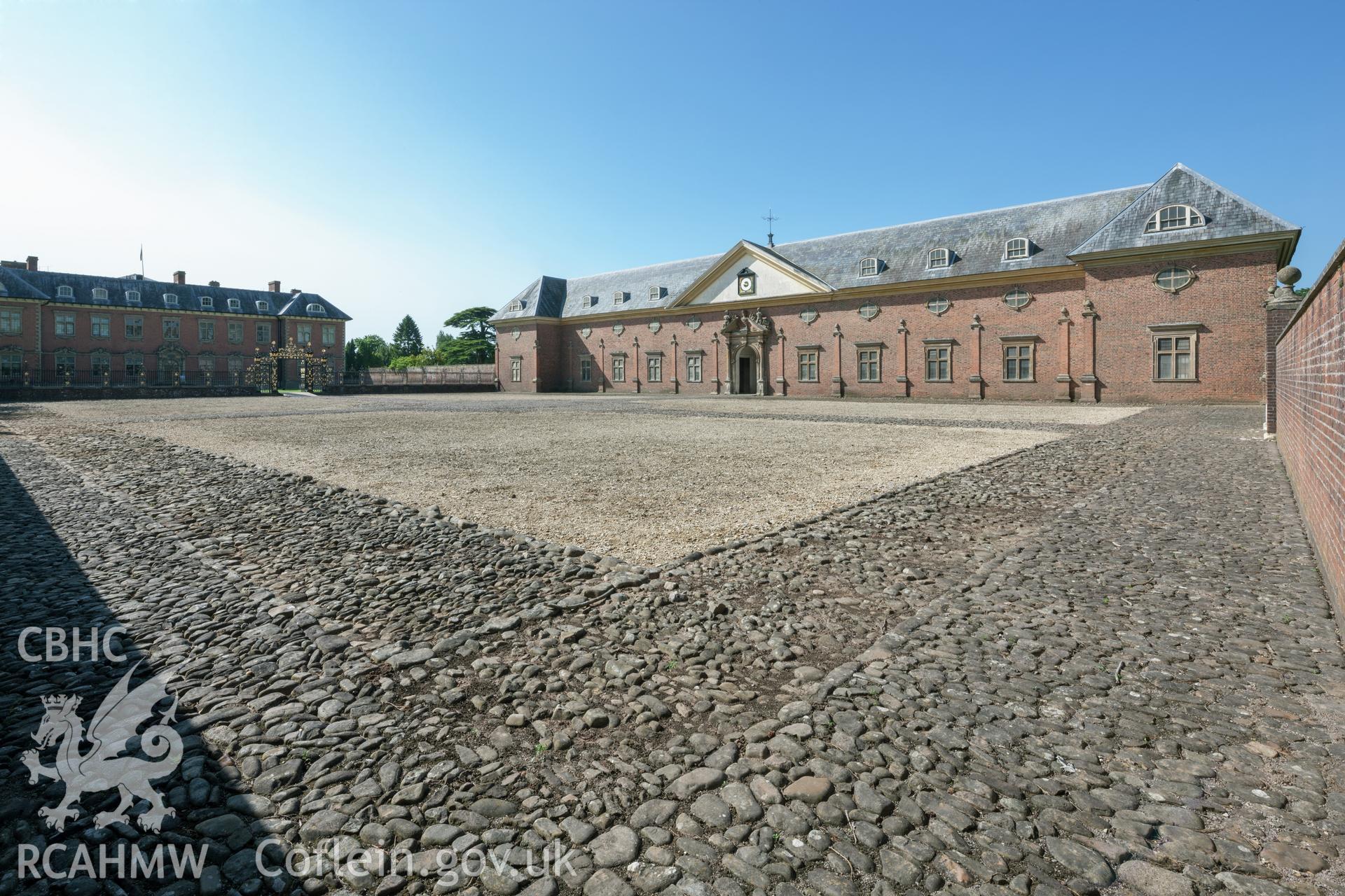 Oblique view from the north, including main house