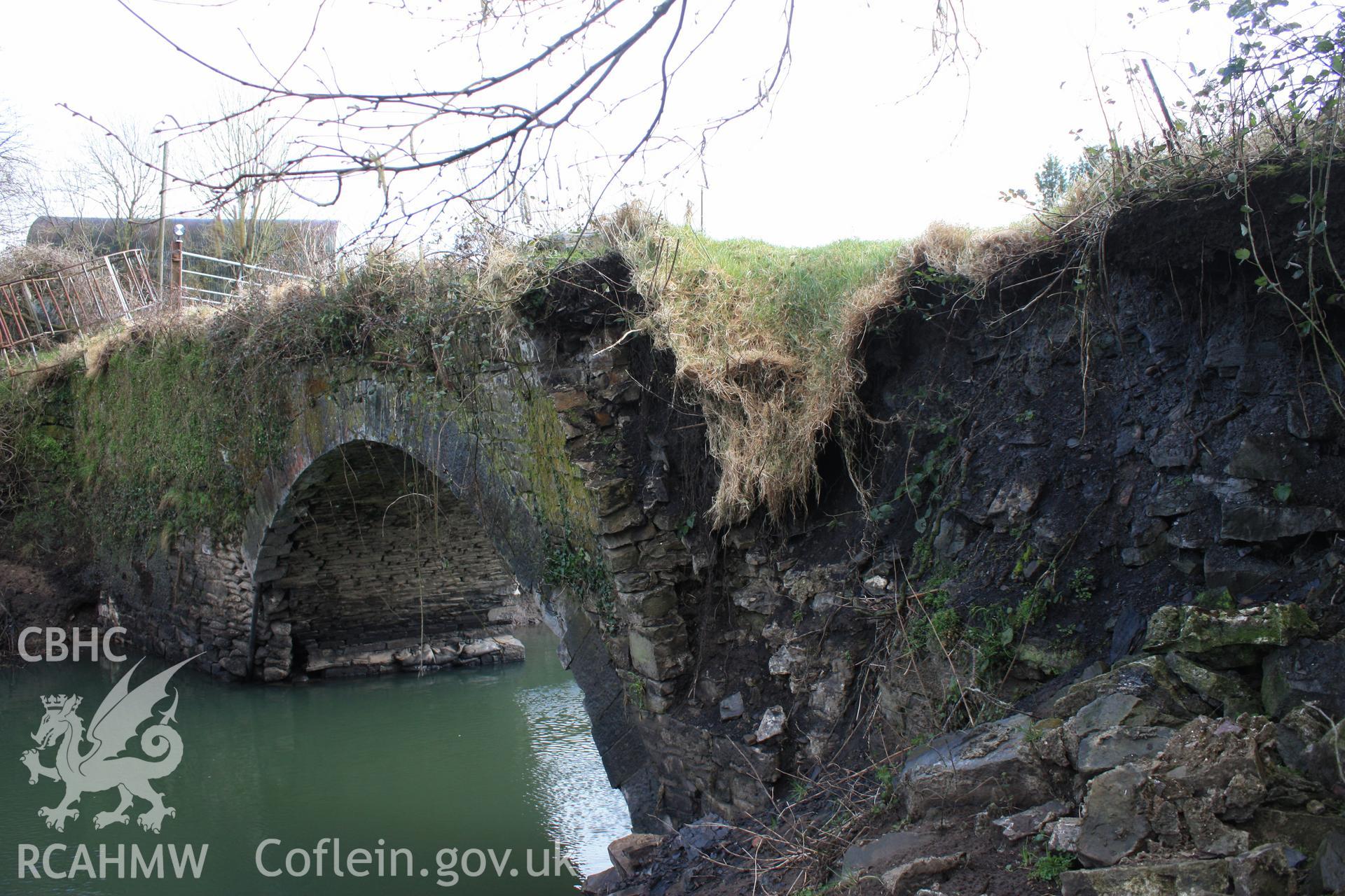 North elevation; oblique view looking east showing collapse of abutment and wing wall