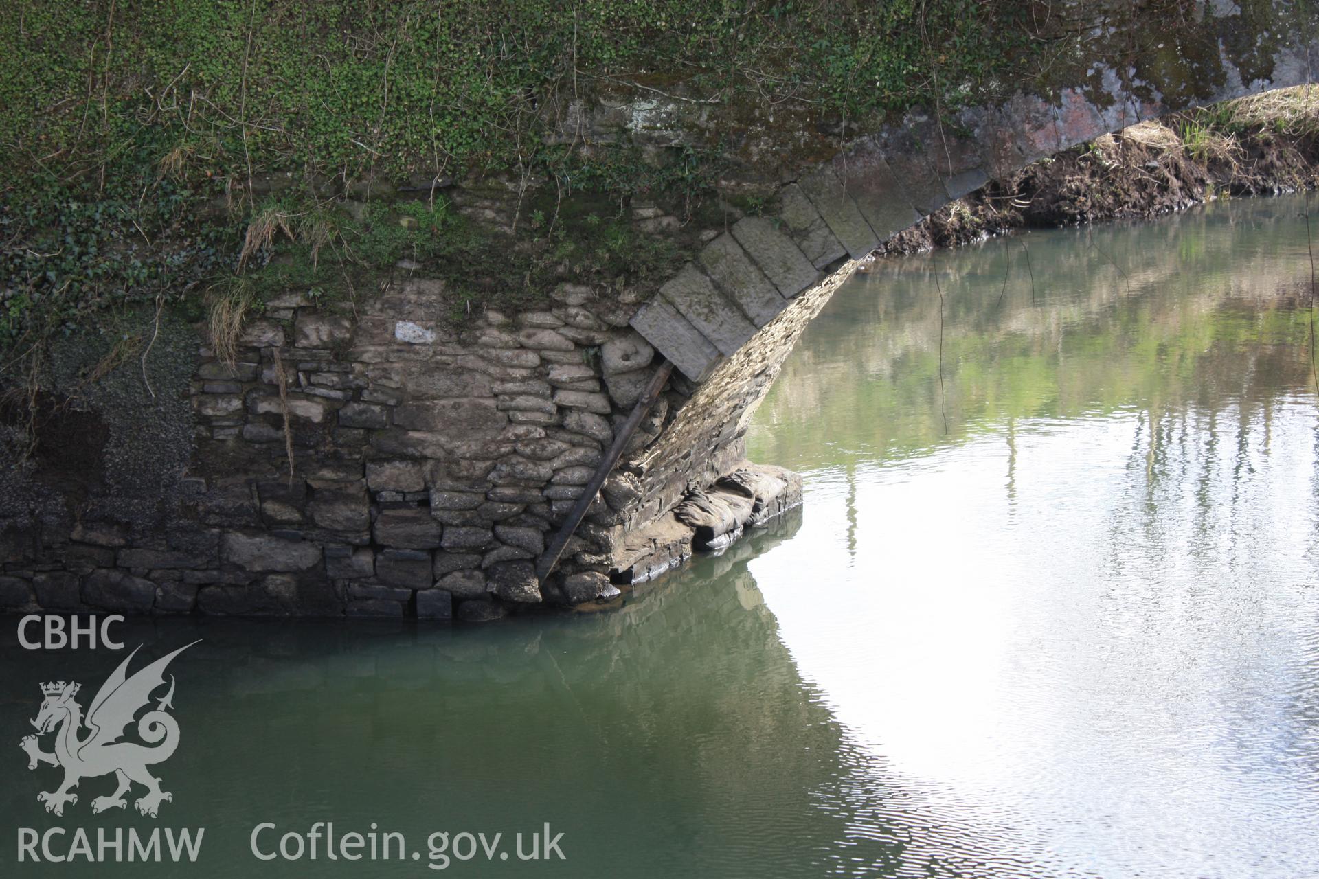 North elevation; earlier repair work to east side of arch and abutment