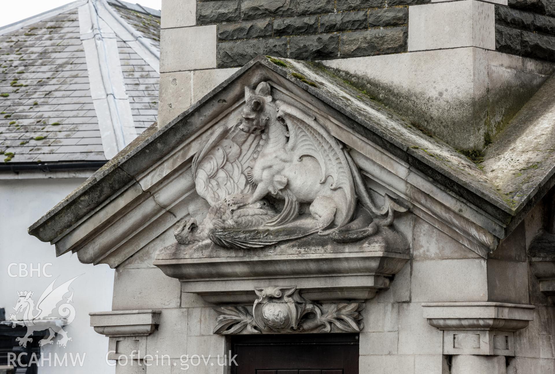 Carving of Welsh dragon on German eagle