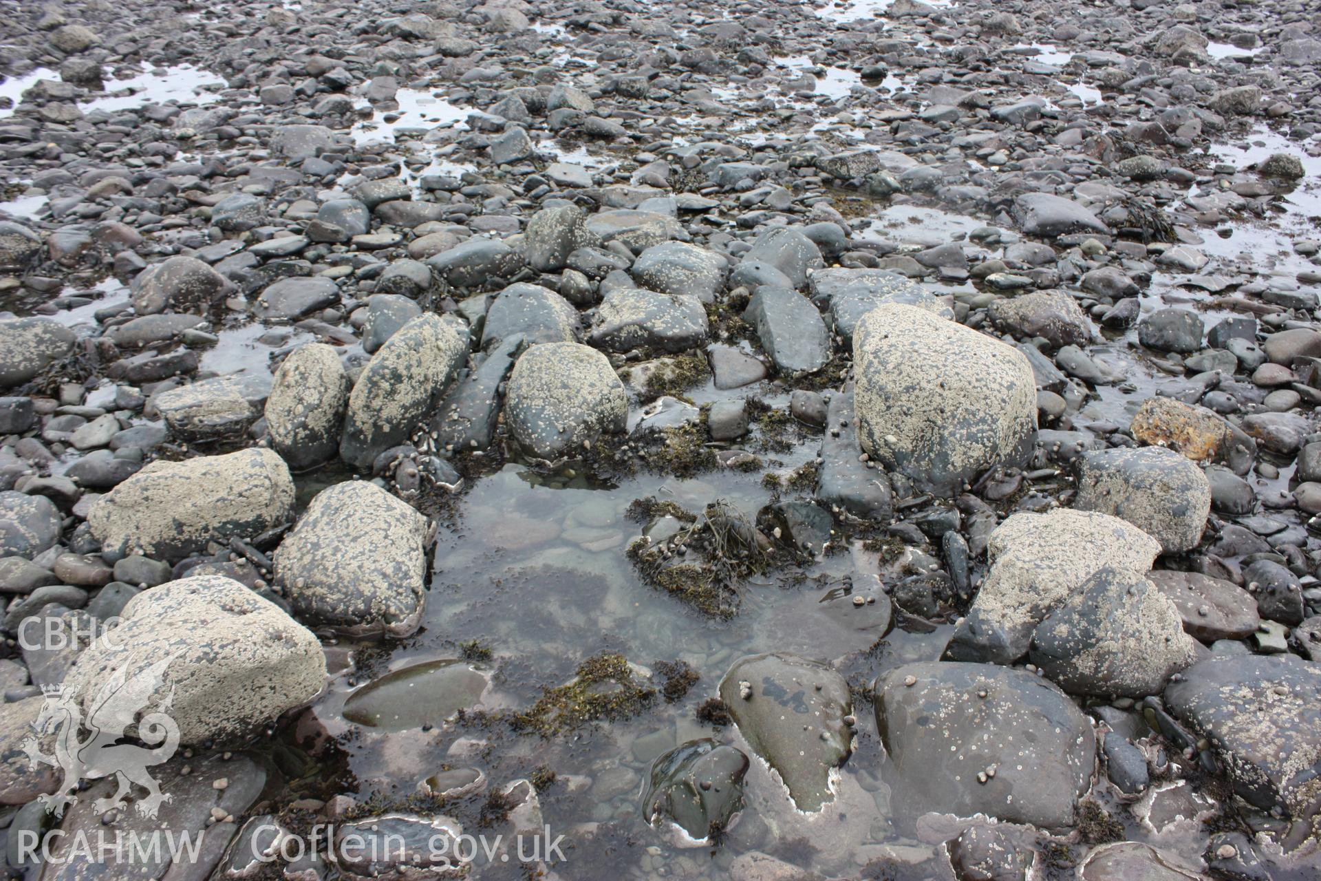 Centre of fish trap arm. Well preserved cod end or sluice, looking west.