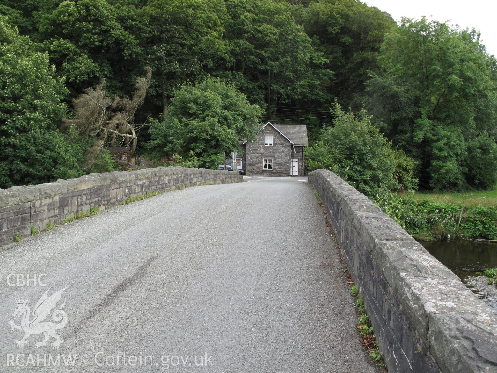 View of Maentwrog Bridge roadway and Tollgate Cottage from the northwest, taken by Brian Malaws on 05 August 2009.