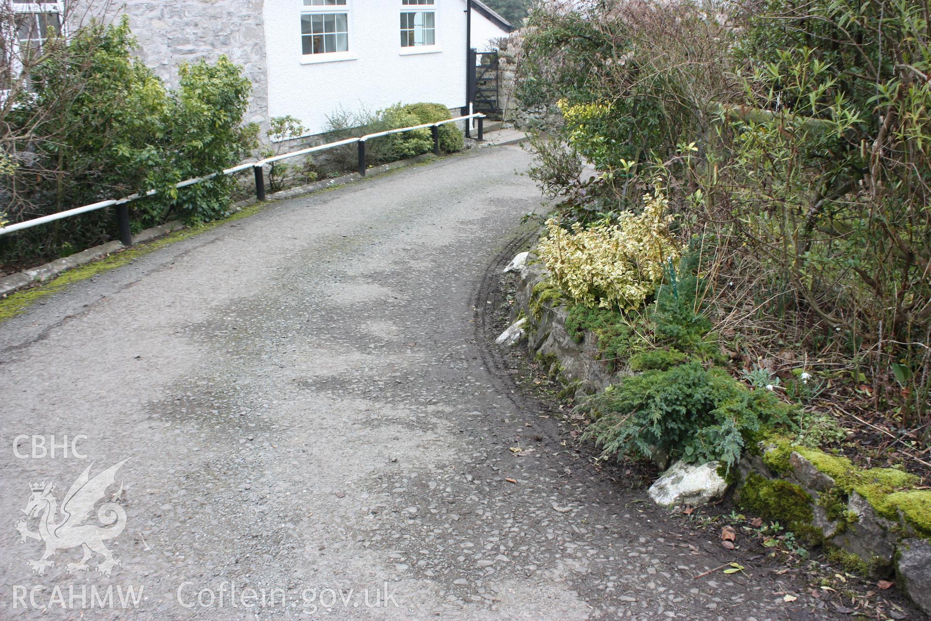 Road at Pen-y-graig, leading from former quarry offices into Froncysyllte village and ultimately to the Telford Road (modern A5). White curbstones indicate the sharp bend of the road here.